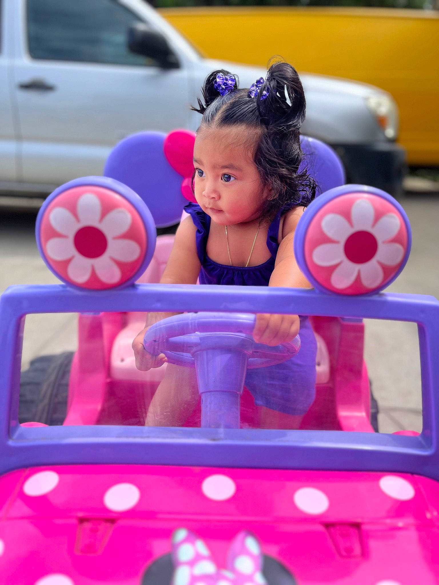 Jocelyn is registered to the contest to win money with this photo: audio_equipment, automotive_design, automotive_exterior, blue, car, electric_blue, entertainment, eyewear, fun, gadget, happy, magenta, motor_vehicle, person, pink, purple, recreation, red, snapshot, toy