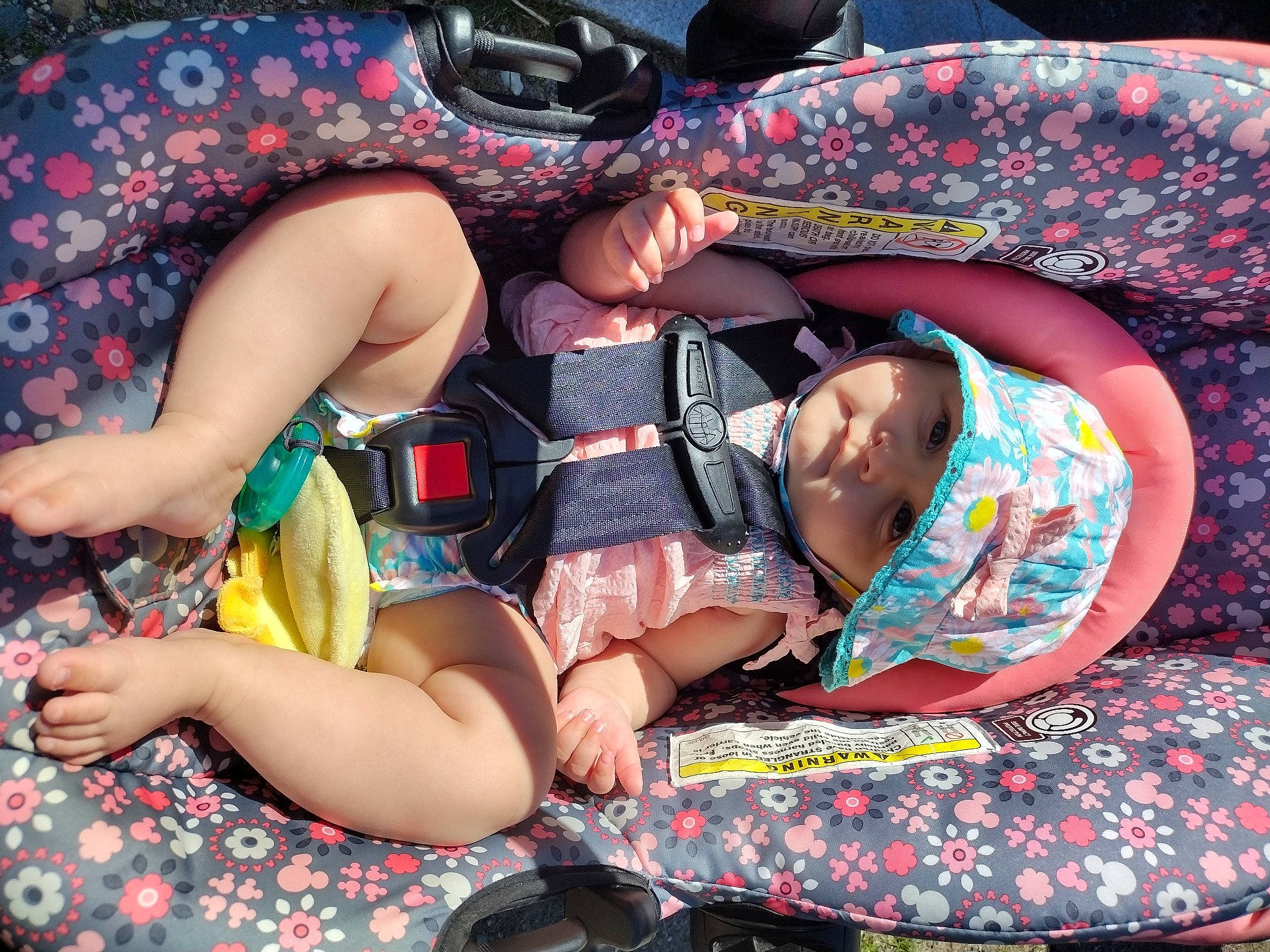 Lilliana joined the competition — help win amazing prizes! chest, child, comfort, event, facial_expression, flesh, foot, fun, happy, headwear, human_body, human_leg, lap, magenta, nail, pattern, person, pink, sitting, textile