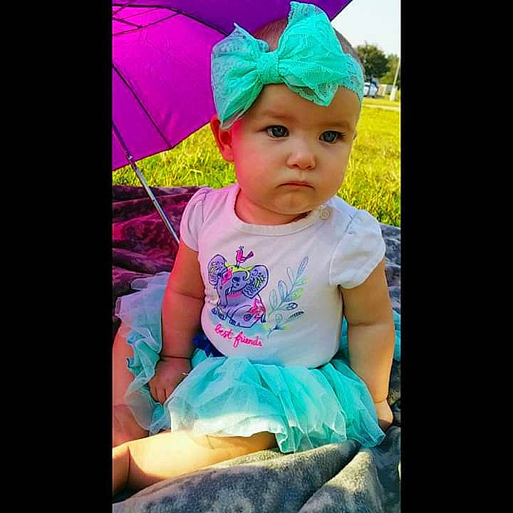 Sierra is registered to the contest to win money with this photo: baby, baby_products, baby_toddler_clothing, child, clothing, cool, costume, fashion_accessory, hair_accessory, happy, head, headband, headgear, headwear, person, pink, play, product, purple, smile