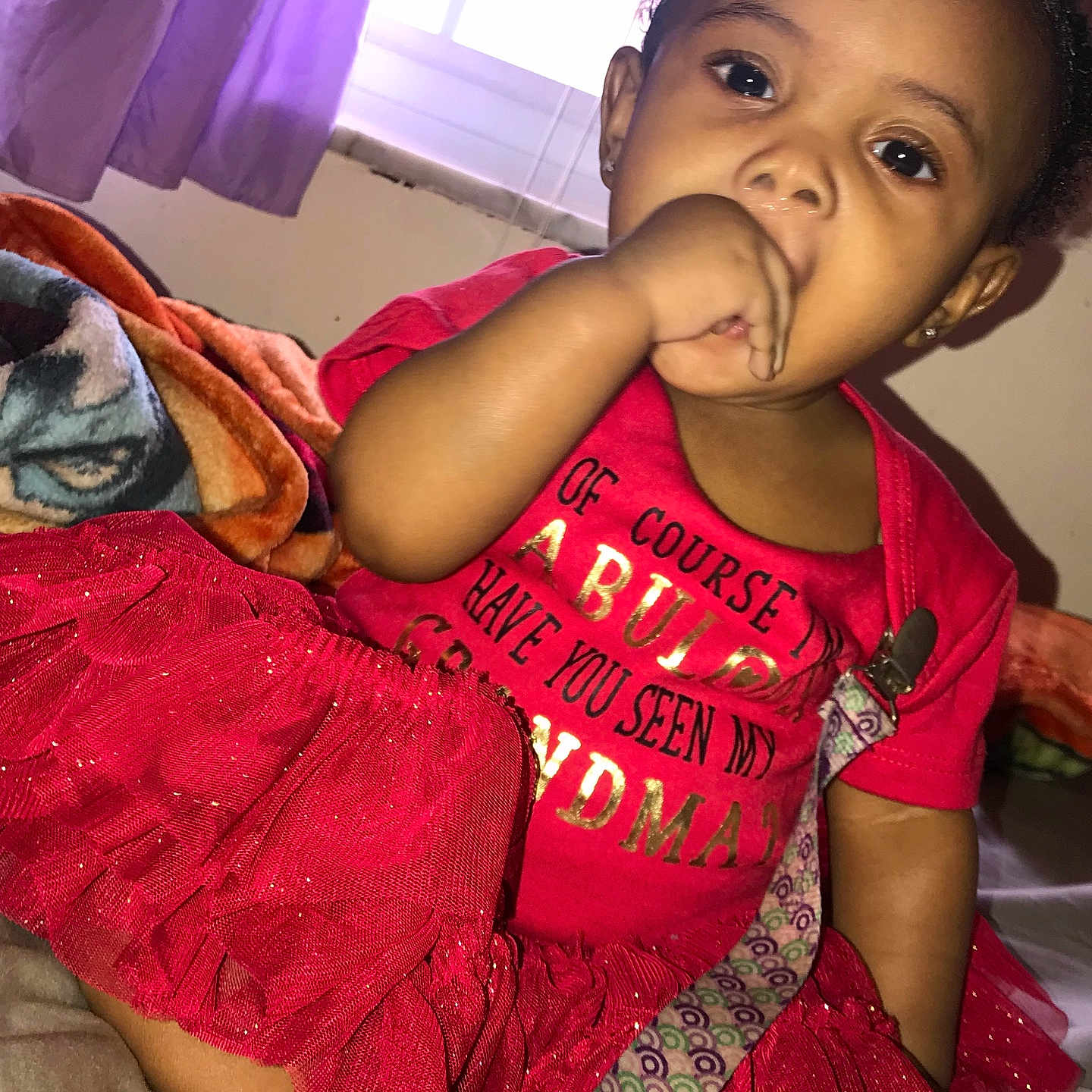 Azayliah is registered to the contest to win money with this photo: bed, bedroom, bodypart, child, clothing, couch, dress, face, female, finger, furniture, girl, hand, head, indoors, person, photography, portrait, sitting, t_shirt