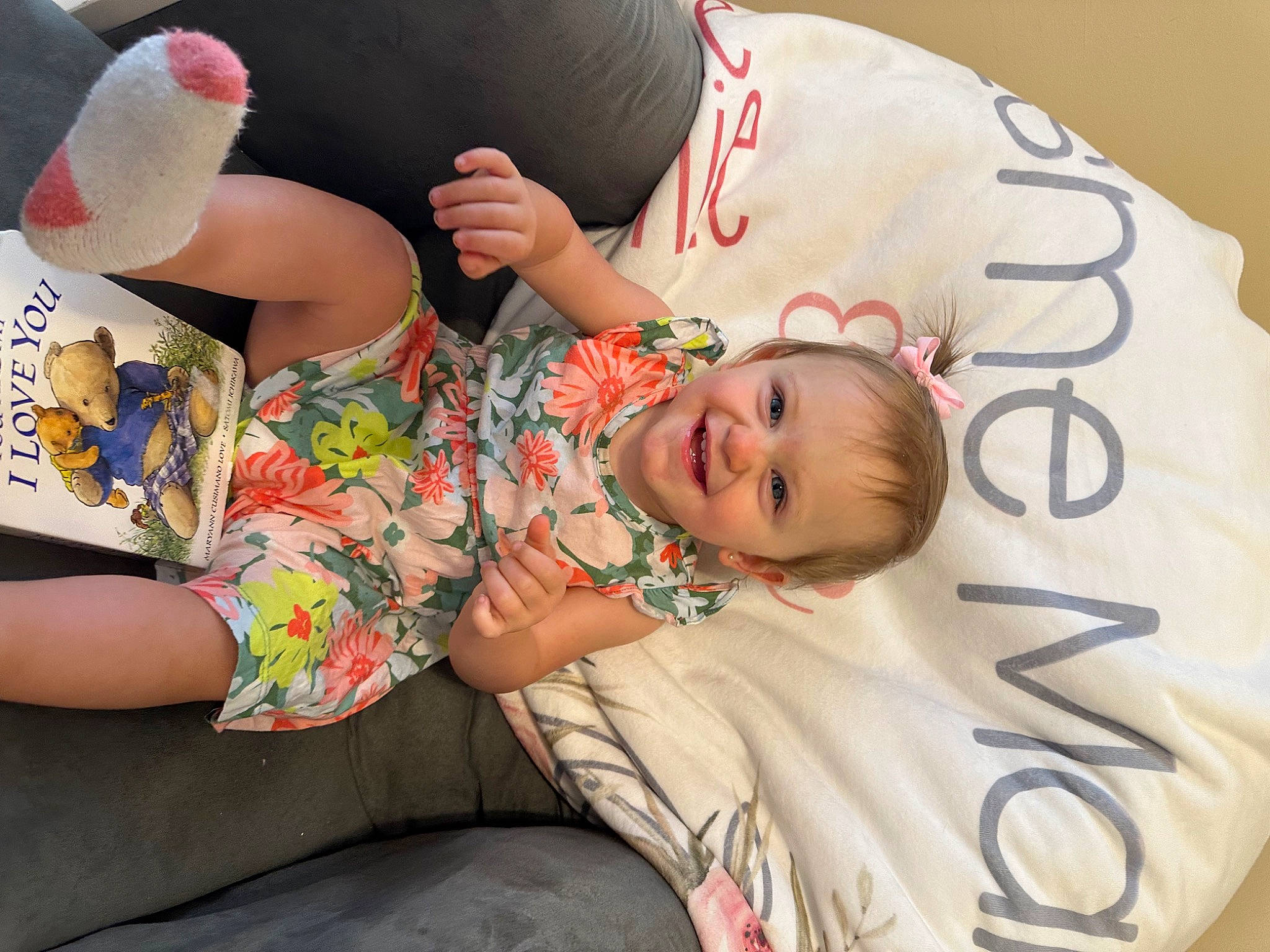 Esmé joined the competition — help win amazing prizes! baby, baby_toddler_clothing, child, comfort, couch, elbow, finger, foot, fun, happy, human_leg, joy, linens, person, pink, sitting, skin, smile, t_shirt, textile