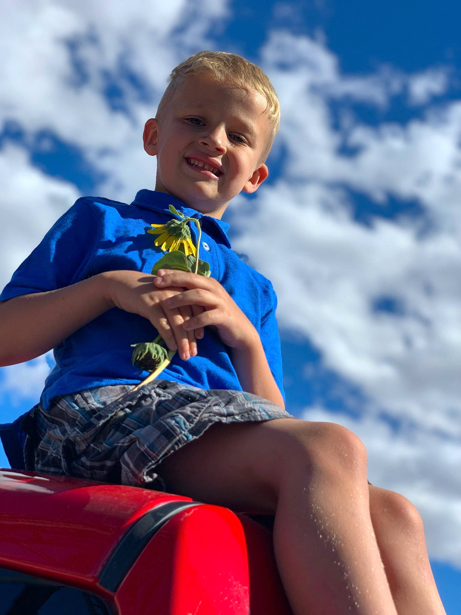 Graysyn joined the competition — help win amazing prizes! blue, child, electric_blue, fun, happy, joy, leisure, lifejacket, person, sitting, sky, smile, summer, toddler, vacation