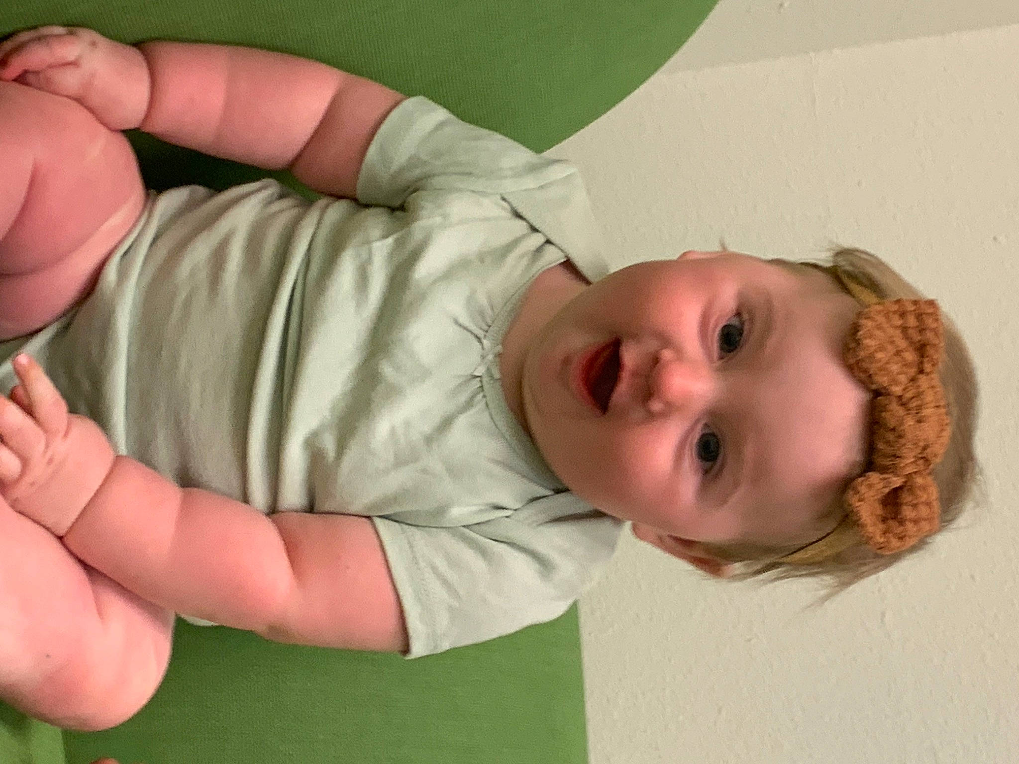 Elisabeth is registered to the contest to win money with this photo: cheek, chin, comfort, eye, facial_expression, finger, gesture, grass, hair, hairstyle, hand, happy, human_body, lip, mouth, nose, person, skin, sleeve, smile