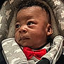 Champ joined the competition — help win amazing prizes! baby, infant, newborn, child, car_seat, bow_tie, blanket, portrait, face, eyes, hair, ear, pattern, fabric, stroller, cozy, looking_up, closeup, adorable, clothing