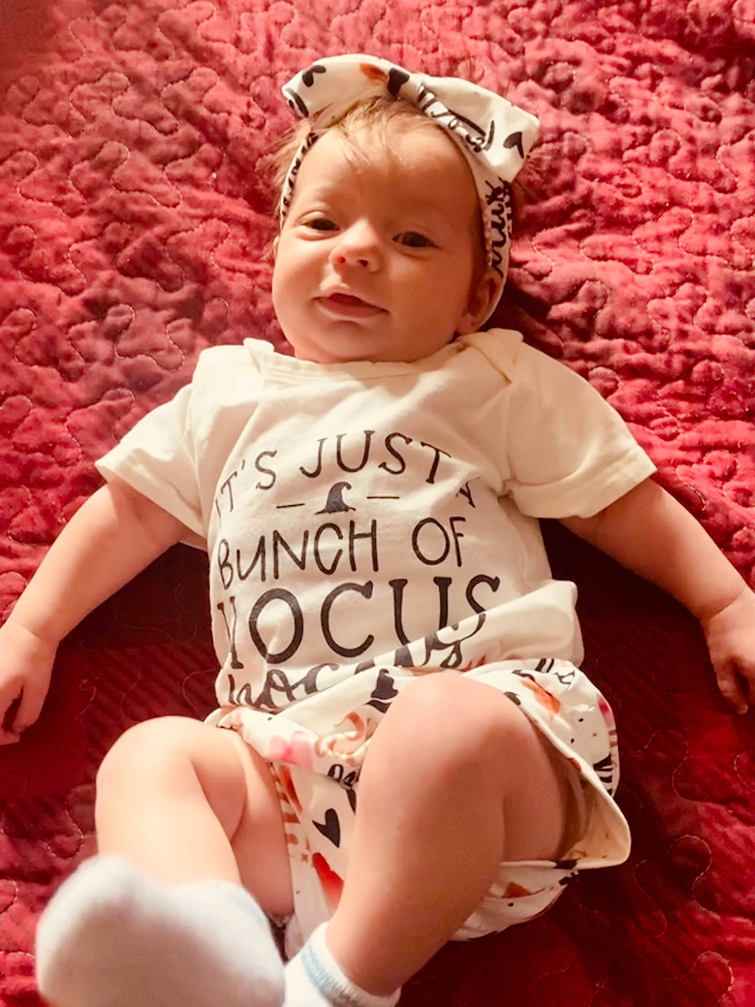 Avalynn is registered to the contest to win money with this photo: baby, baby_toddler_clothing, cheek, child, comfort, cool, facial_expression, fun, hairstyle, happy, leg, person, pink, shoe, skin, sleeve, smile, textile, thigh, toddler