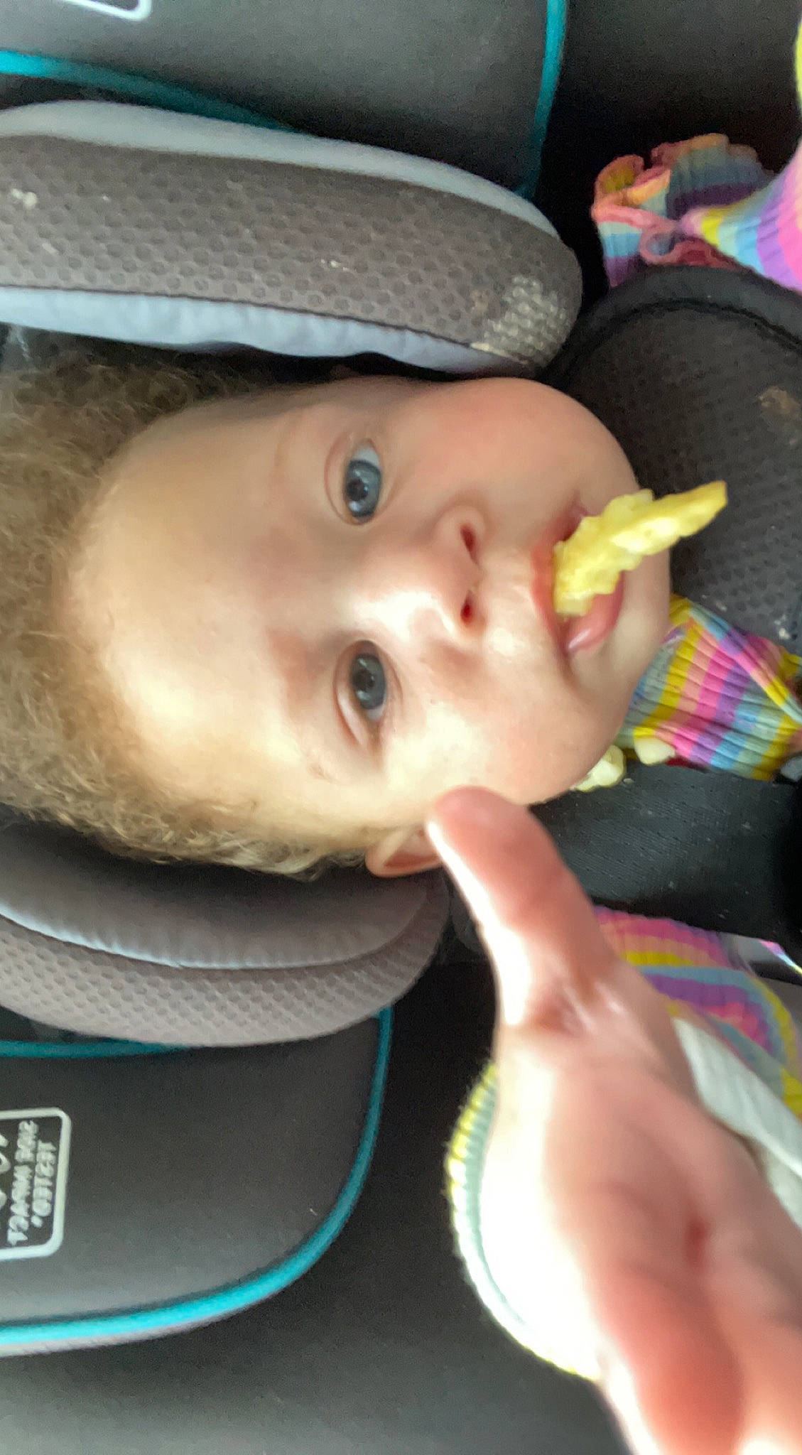 Anora is registered to the contest to win money with this photo: baby, cheek, child, chin, cool, eyebrow, eyelash, facial_expression, fun, gesture, hairstyle, headgear, iris, lip, mouth, nose, people, person, skin, smile