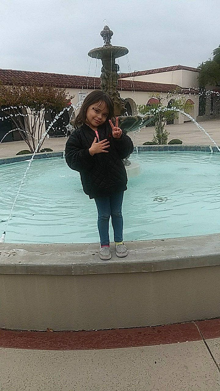 Angelica joined the competition — help win amazing prizes! fountain, fun, jeans, joy, leg, leisure, long_hair, person, photography, tourism, tree, vacation, water, water_feature, winter