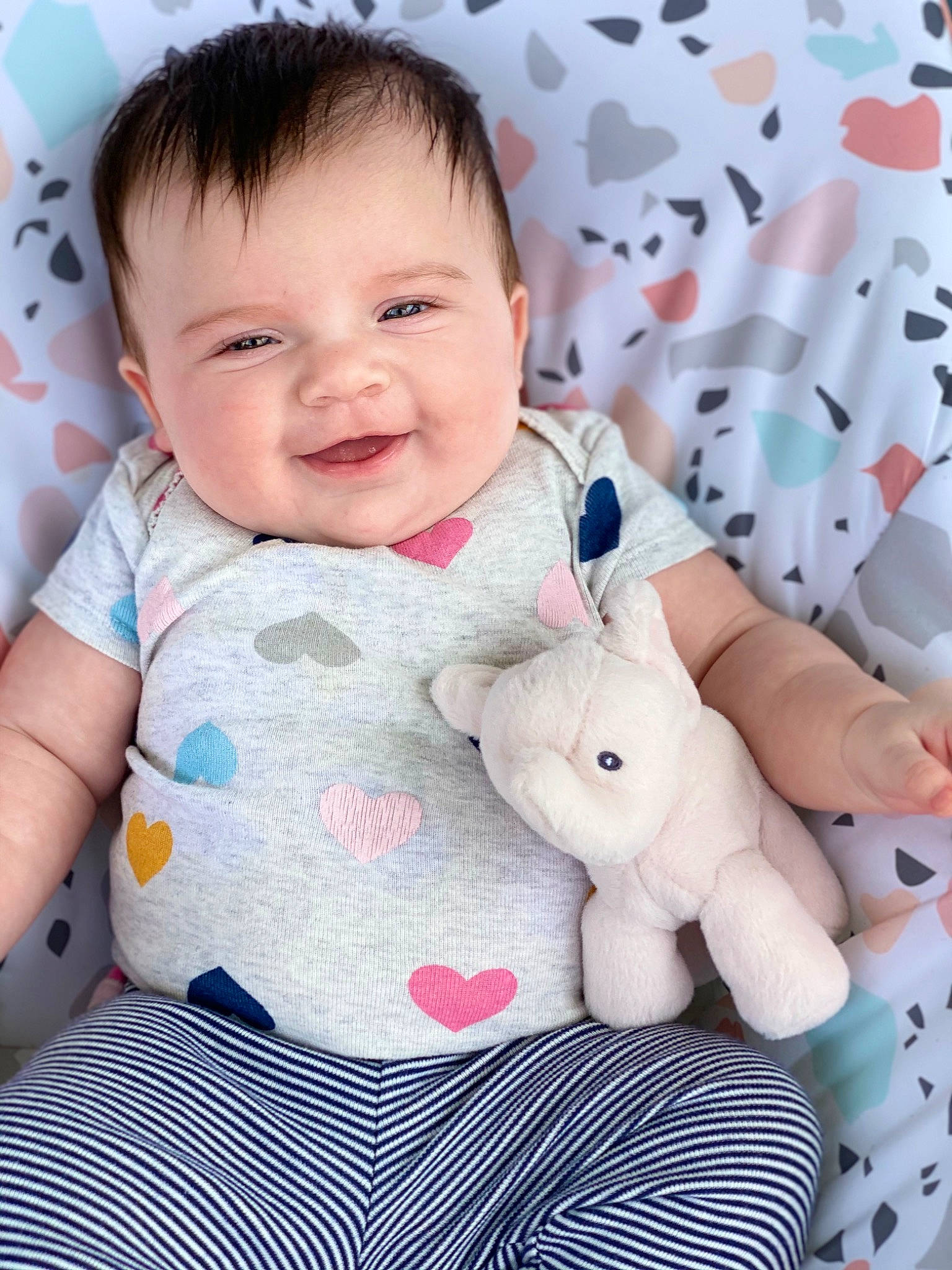 Adrianna joined the competition — help win amazing prizes! baby, baby_toddler_clothing, cheek, child, collar, comfort, finger, happy, joy, linens, pattern, person, pink, product, skin, sleeve, smile, textile, thumb, toddler