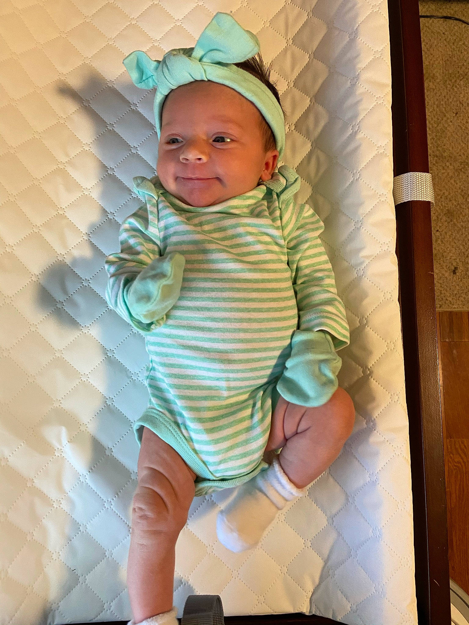 Adrianna is registered to the contest to win money with this photo: baby, baby_safety, baby_toddler_clothing, cap, cheek, child, comfort, eye, fun, happy, head, pattern, person, room, skin, sleeve, smile, t_shirt, textile, thigh