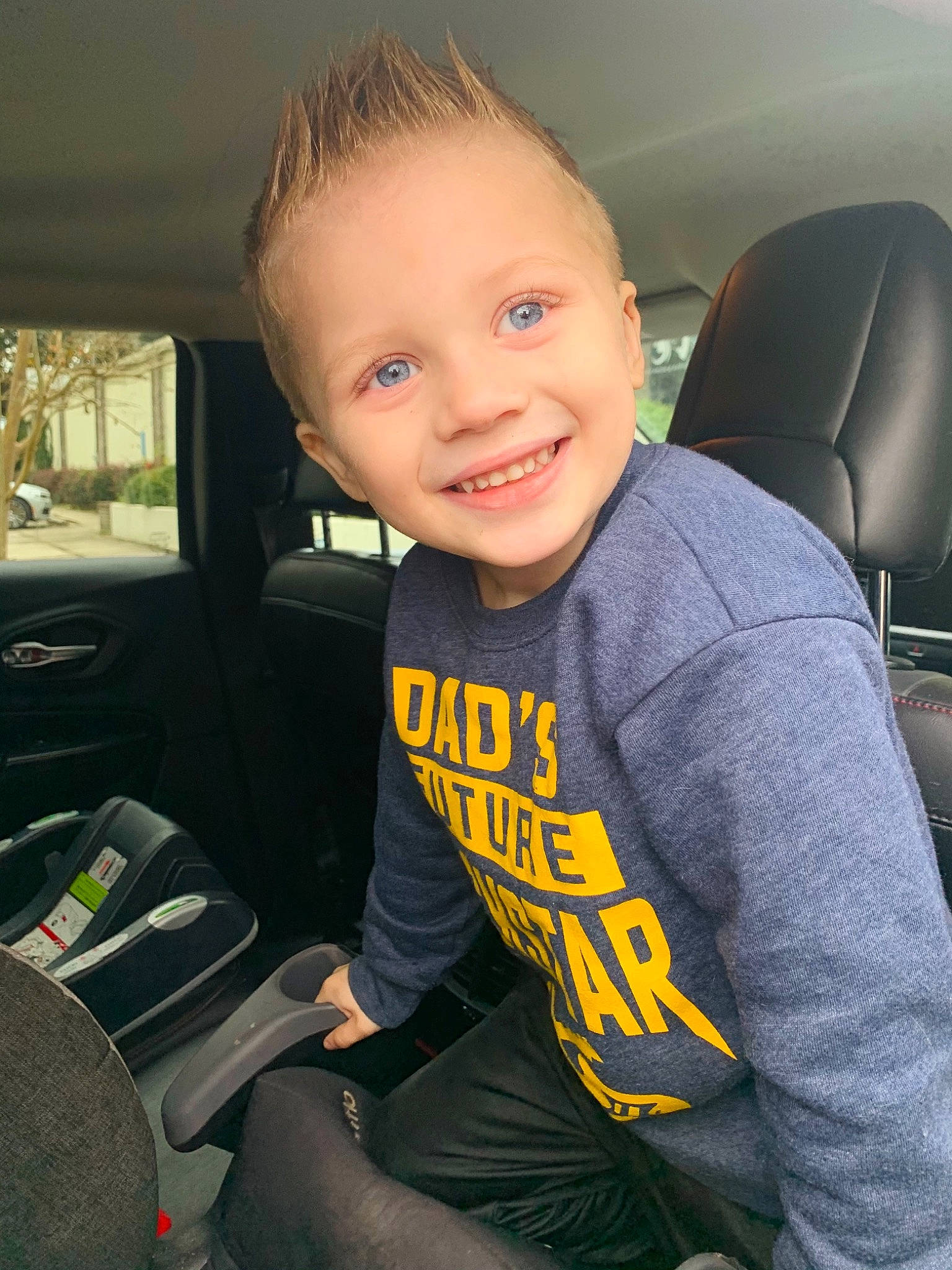Conor joined the competition — help win amazing prizes! auto_part, automotive_design, automotive_tire, car, car_seat, car_seat_cover, chair, child, eye, happy, head_restraint, joy, motor_vehicle, person, seat_belt, sleeve, smile, steering_wheel, t_shirt, toddler