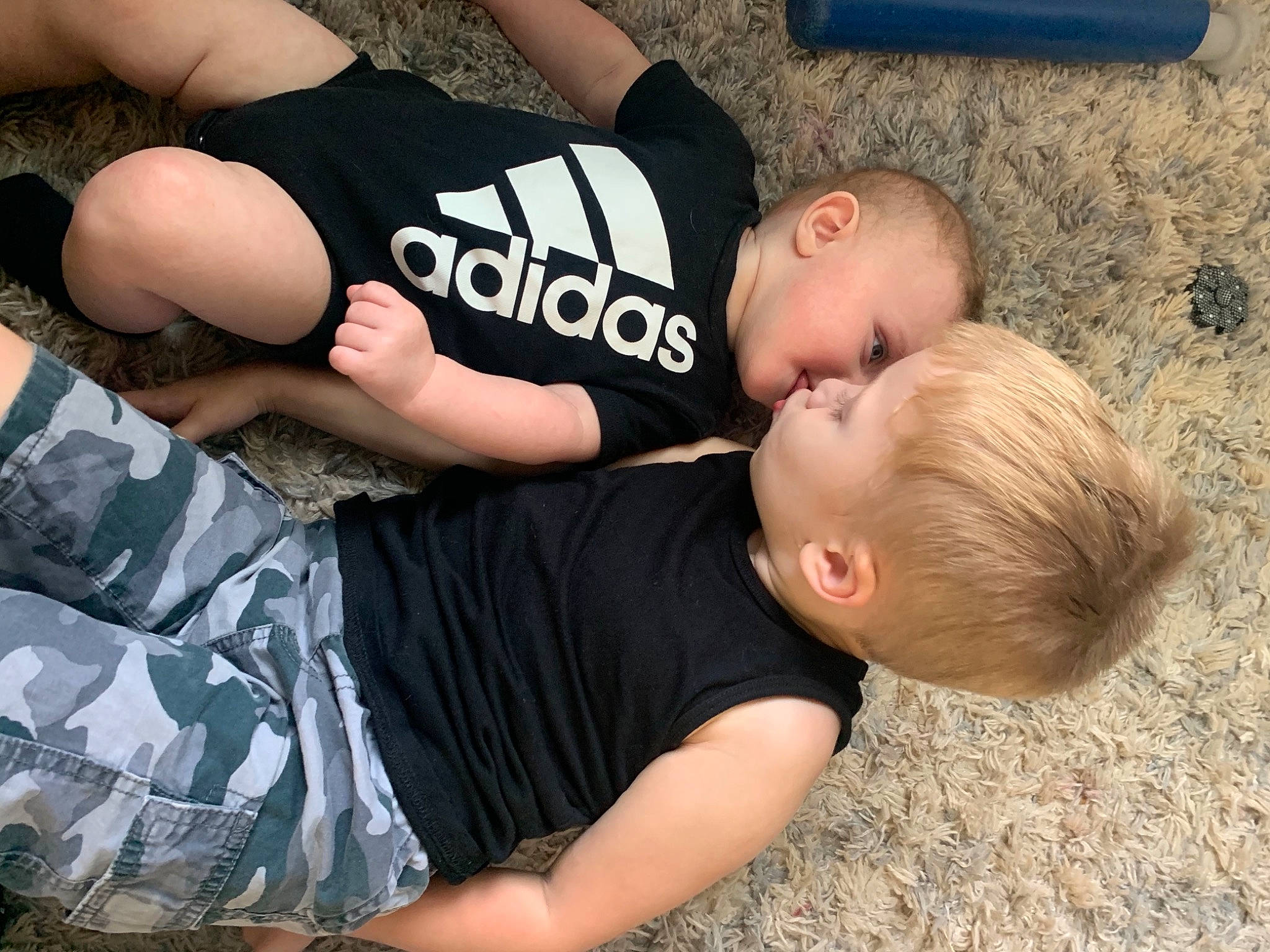 Colin is registered to the contest to win money with this photo: arm, baby, baby_toddler_clothing, child, comfort, elbow, fun, gesture, happy, human_leg, joint, leisure, muscle, people, person, sleeve, t_shirt, thigh, toddler, trunk