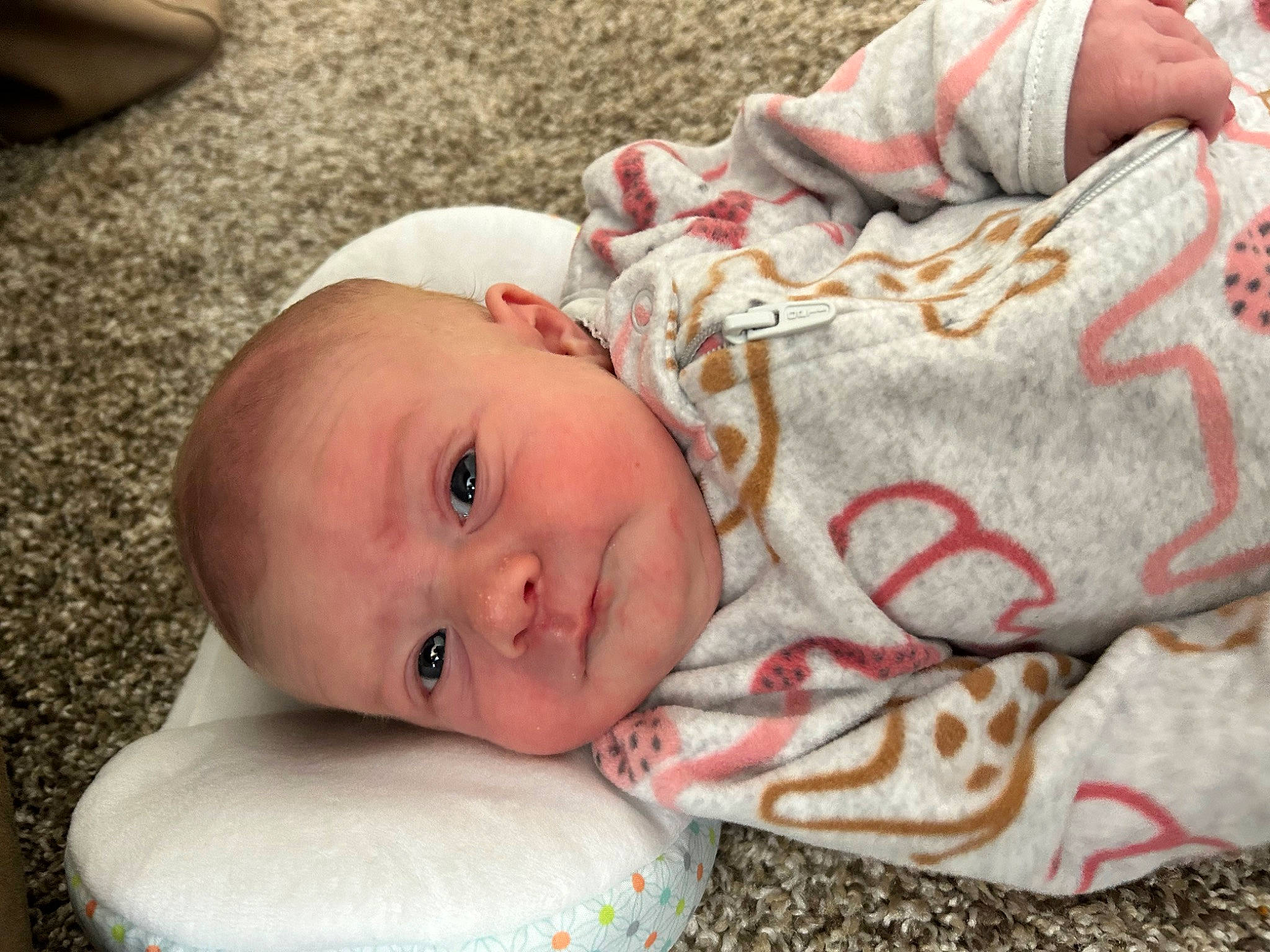 Lucy is registered to the contest to win money with this photo: baby, baby_products, baby_toddler_clothing, cheek, child, comfort, grass, happy, hat, linens, lip, mammal, nose, person, room, sitting, skin, smile, textile, toddler