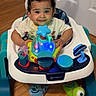 Kross joined the competition — help win amazing prizes! toddler, baby_walker, bunny_ears, toy, indoor, floor, wood_floor, slippers, child, smiling, cute, playful, colorful, lights, clothing, person, headwear, footwear, home, entertainment