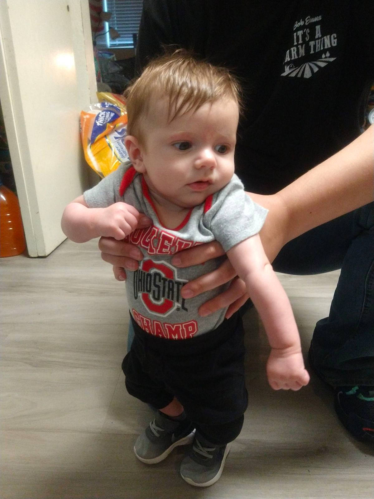 Colton joined the competition — help win amazing prizes! baby, baby_toddler_clothing, child, event, flash_photography, flooring, fun, gesture, hairstyle, human_leg, joint, leg, person, sandal, shoe, sleeve, sneakers, standing, t_shirt, thumb