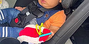 Michael Neil Adames is registered to the contest to win money with this photo: toddler, sleeping, car_seat, child, toy, plush_toy, seatbelt, car_interior, clothing, denim, orange_shirt, black_hair, safety, seat, child_safety_seat, baby, peaceful, indoor, car_door, cup_holder