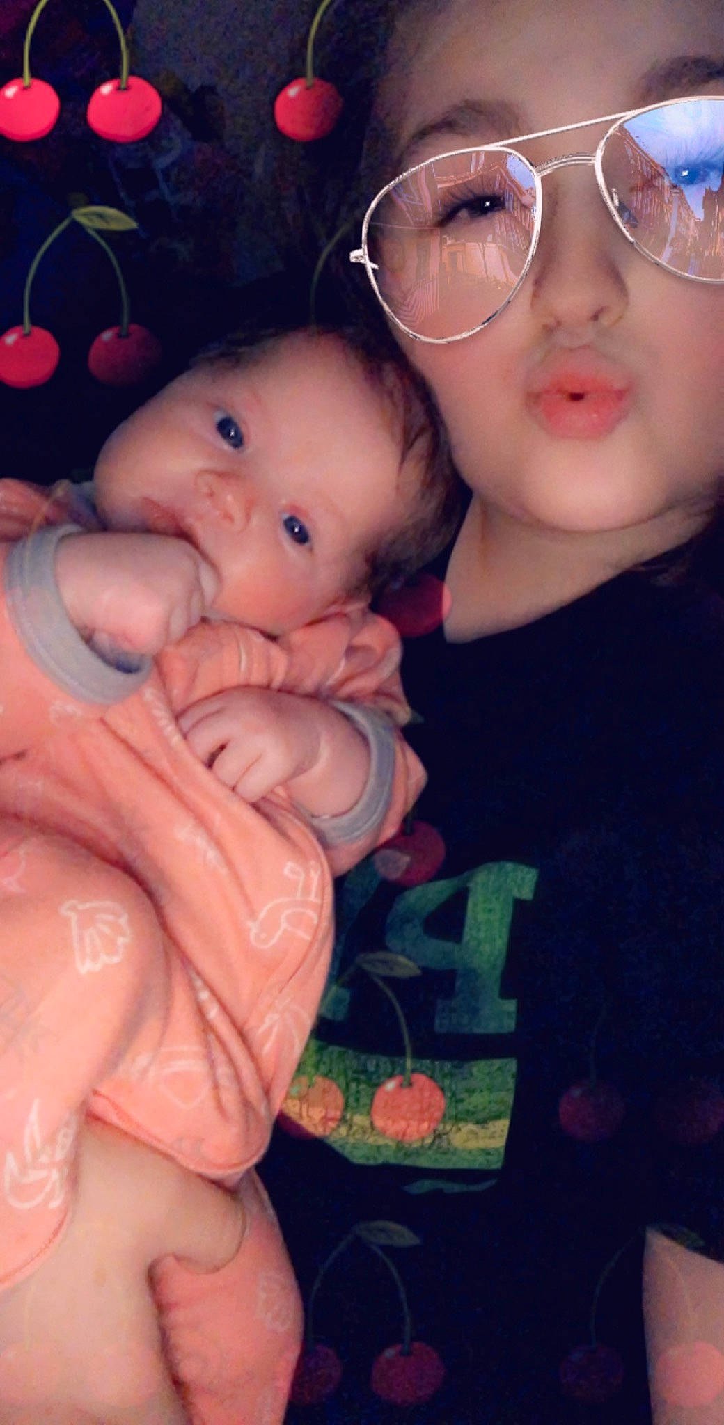 Brynley joined the competition — help win amazing prizes! baby, black_hair, cheek, child, daughter, eye, face, finger, fun, gesture, hand, lip, mouth, nose, person, skin, smile, thumb, toddler