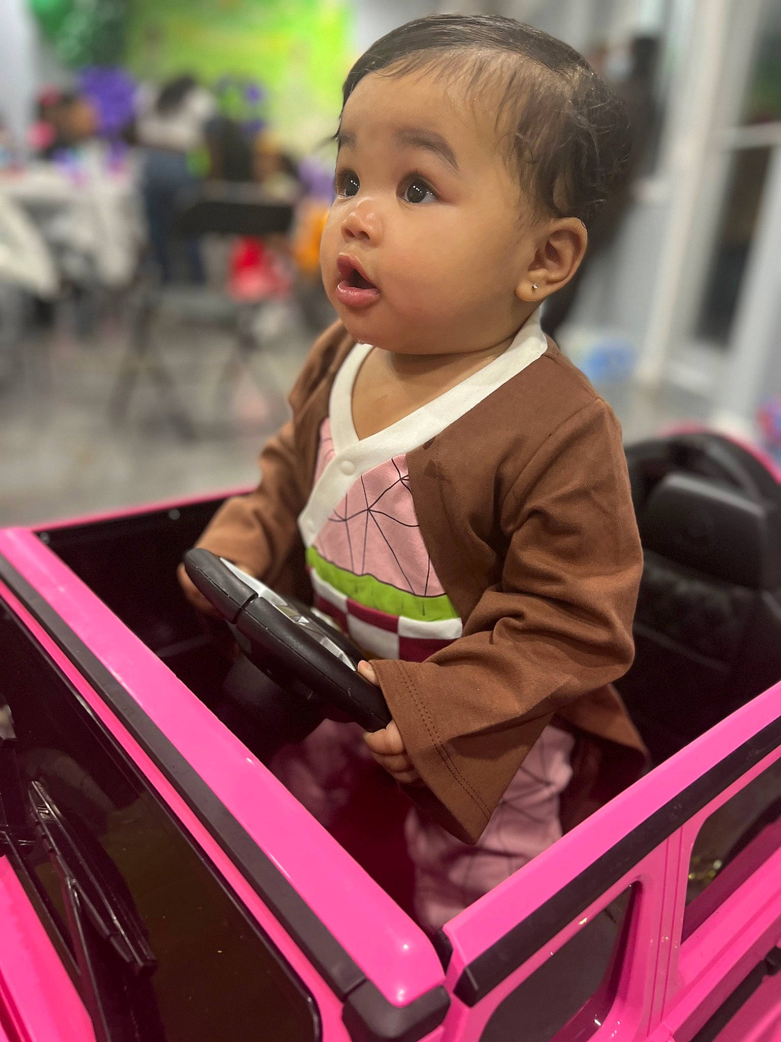Milan Miyu joined the competition — help win amazing prizes! baby, baby_carriage, baby_products, baby_toddler_clothing, cheek, child, event, fun, happy, human, leisure, magenta, motor_vehicle, person, pink, sitting, surprise, t_shirt, toddler, vacation