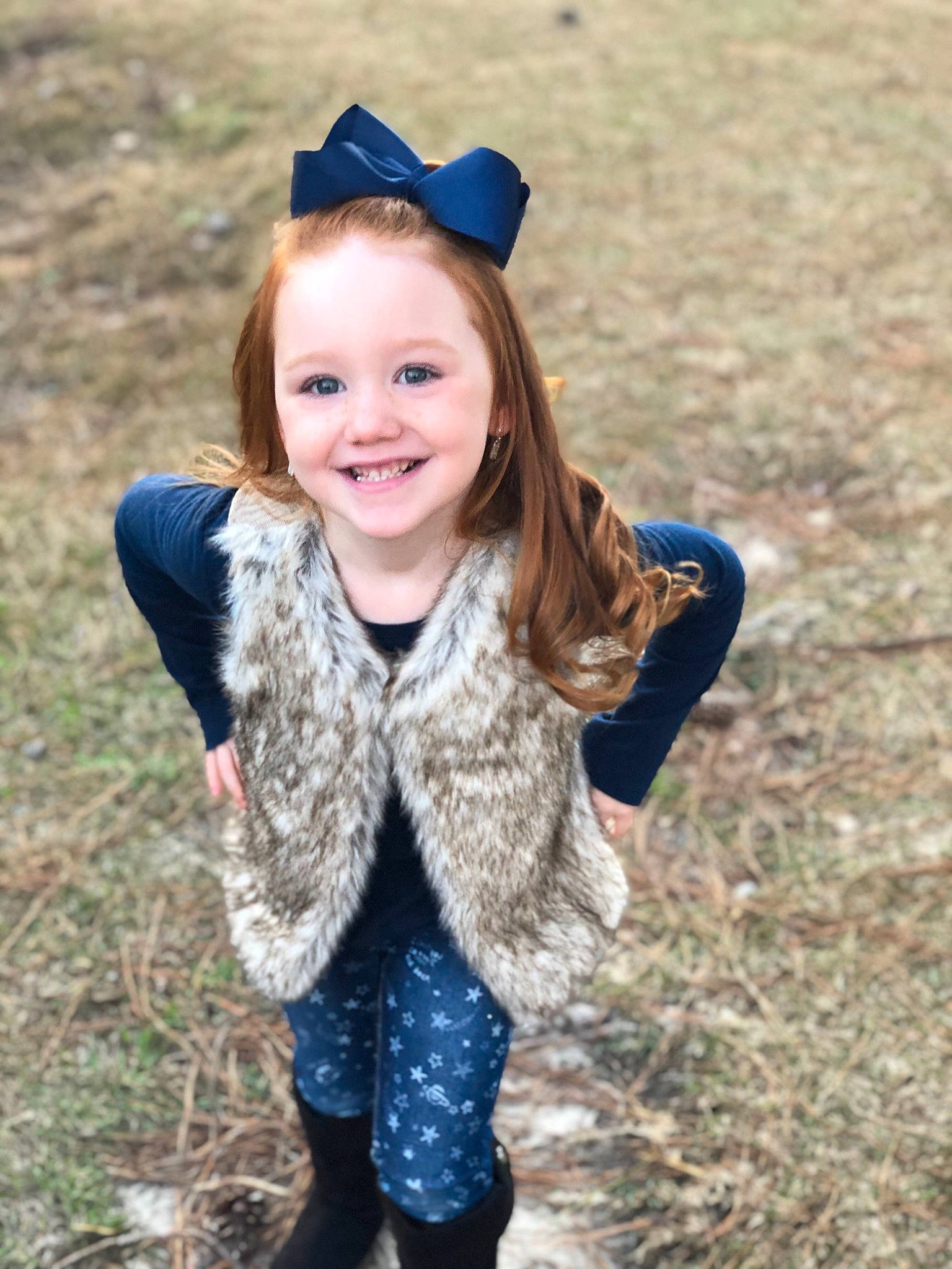Remington is registered to the contest to win money with this photo: cap, child, child_model, clothing, costume_accessory, design, facial_expression, fashion_accessory, fur, happy, headband, headgear, joy, outerwear, pattern, person, photography, play, portrait_photography, smile