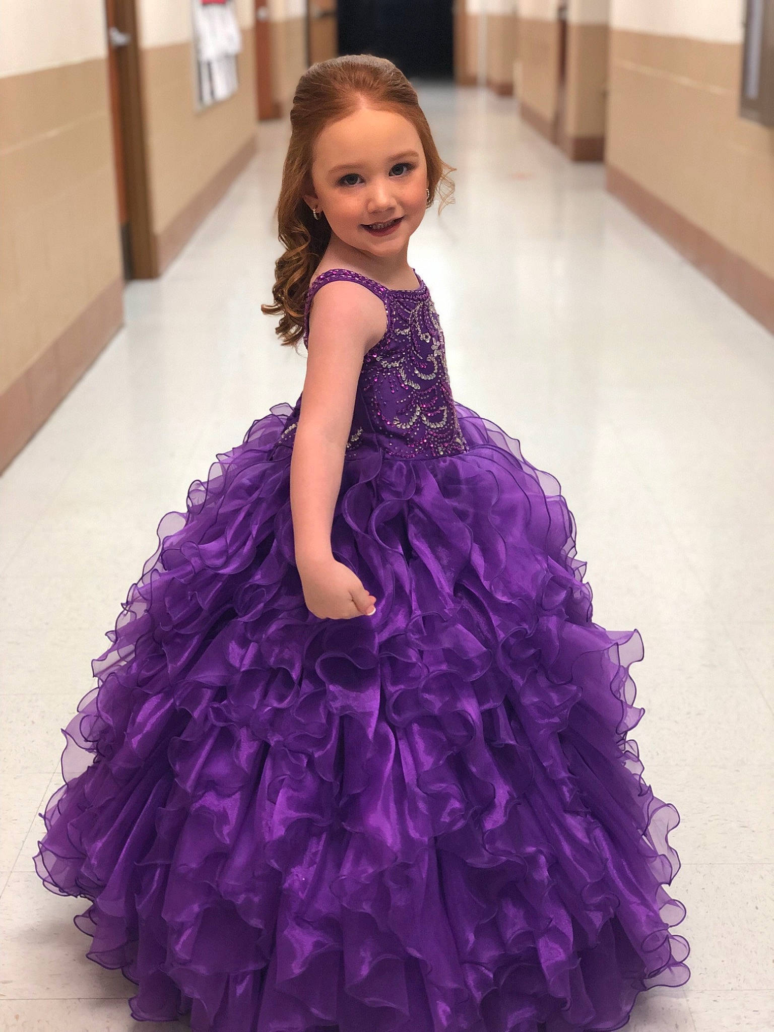 Remington is registered to the contest to win money with this photo: a_line, bridal_party_dress, child, clothing, cocktail_dress, dress, event, fashion, fashion_accessory, formal_wear, gown, haute_couture, joy, lavender, person, purple, ruffle, shoulder, strapless_dress, textile