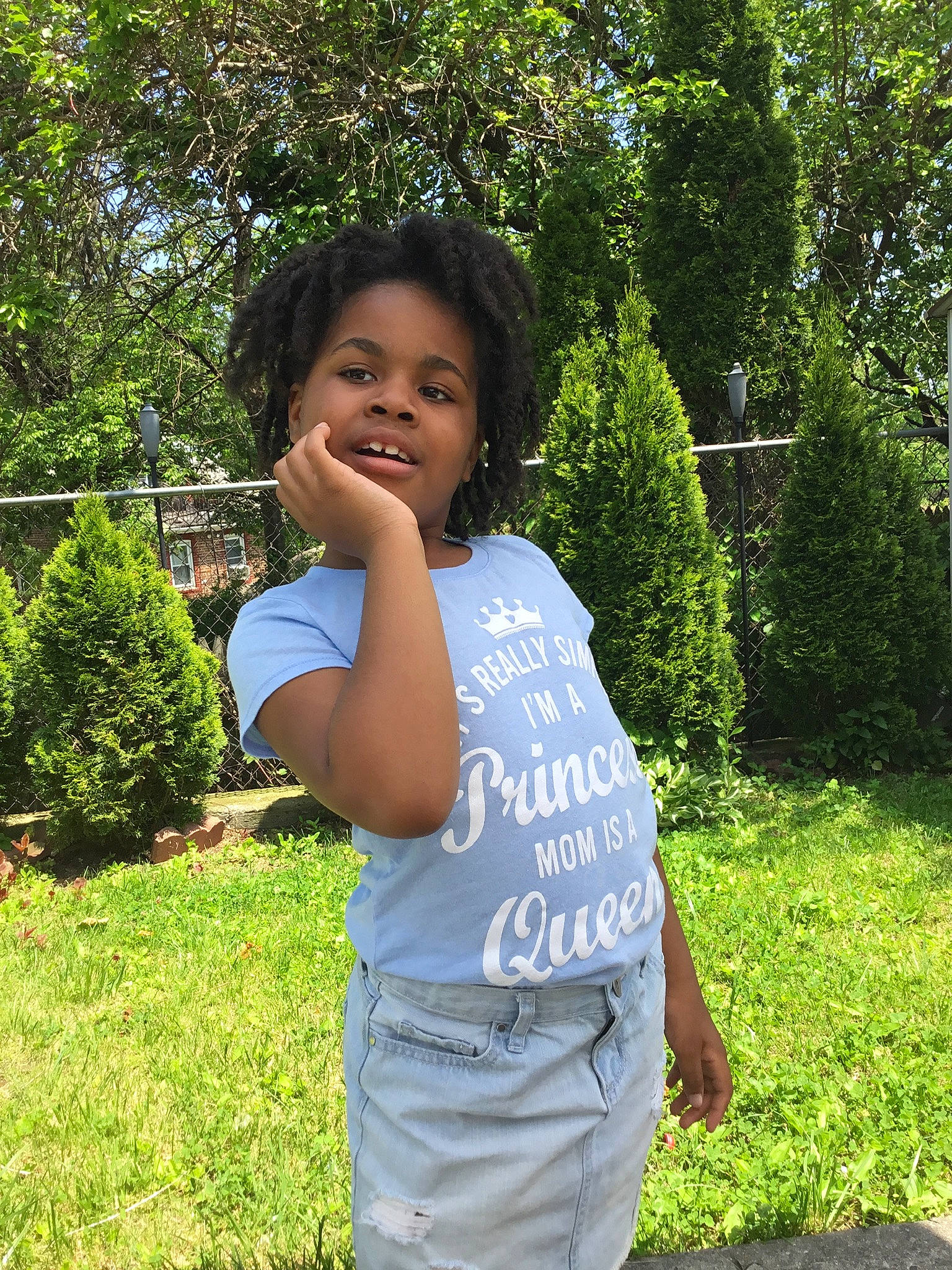 Gabrielle is registered to the contest to win money with this photo: baby_toddler_clothing, backyard, belt, garden, groundcover, hedge, joy, lawn, people_in_nature, person, shrub, sweatpant, yard