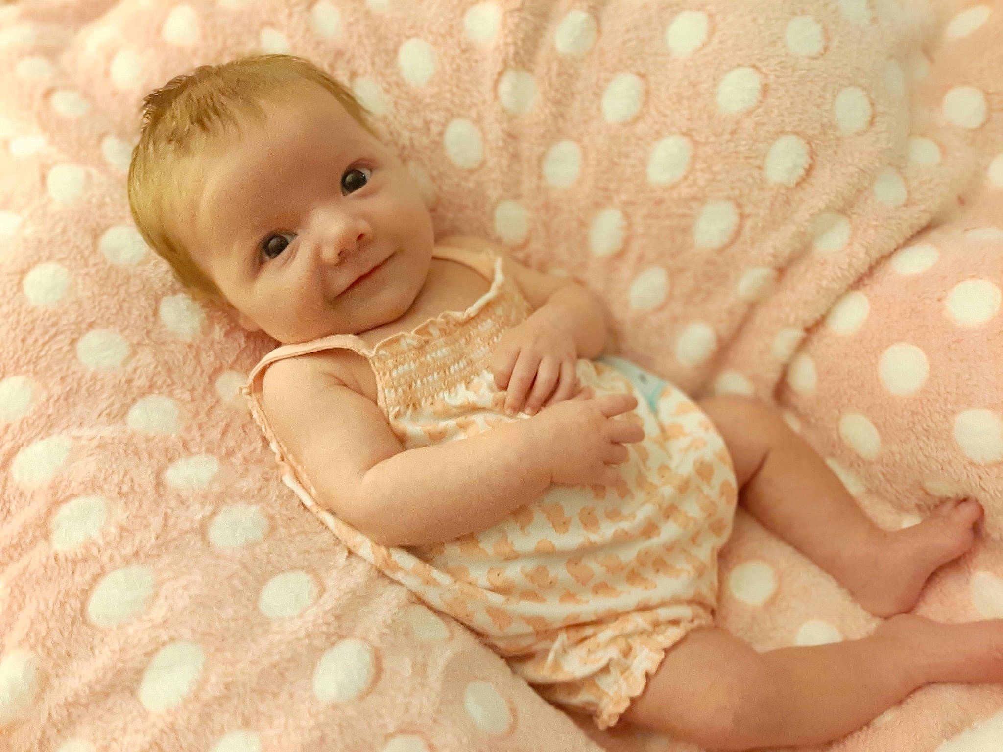 Melissa joined the competition — help win amazing prizes! baby, baby_sleeping, baby_toddler_clothing, beige, child, design, pattern, person, pink, polka_dot, skin, toddler