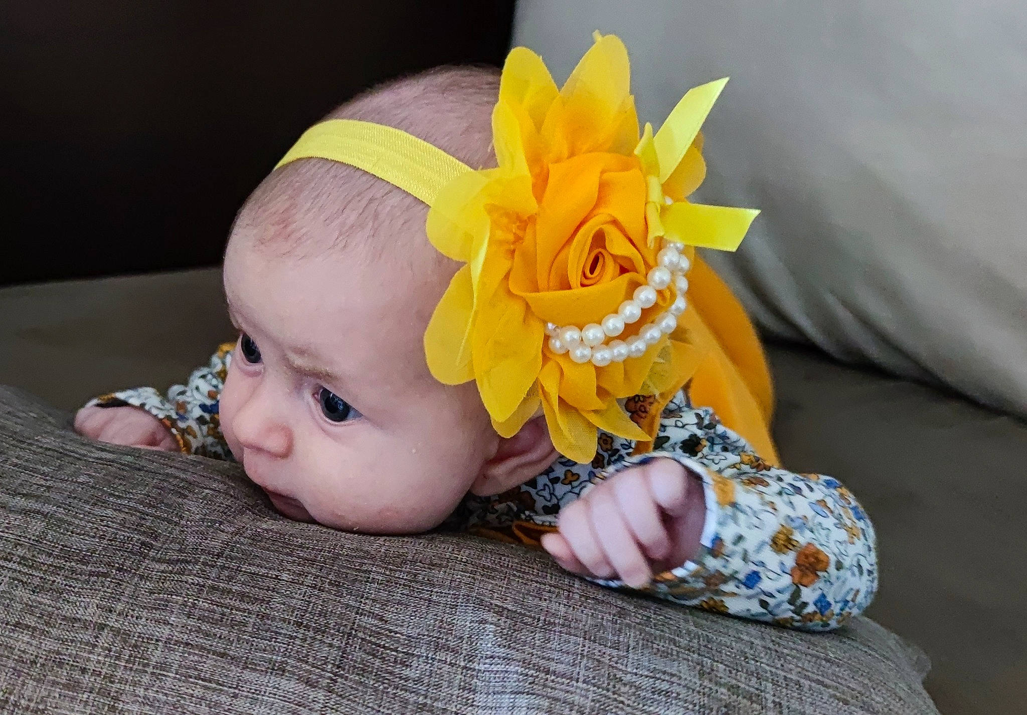 Iliana participe au concours pour gagner de l'argent avec cette photo : arm, baby, baby_products, baby_toddler_clothing, close_up, costume_hat, eye, facial_expression, fashion_accessory, finger, happy, head, headband, headgear, headpiece, iris, person, sitting, skin, toddler