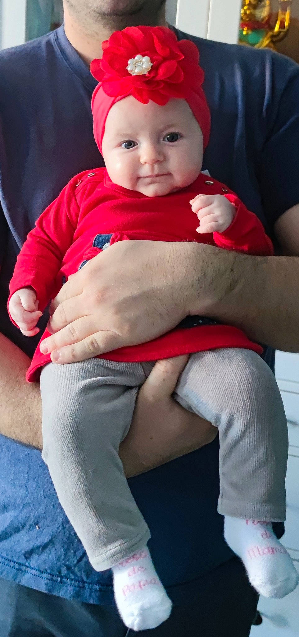 Iliana participe au concours pour gagner de l'argent avec cette photo : arm, baby, baby_toddler_clothing, cap, comfort, finger, happy, head, headwear, joint, knee, lap, leg, muscle, person, pink, red, sleeve, smile, t_shirt
