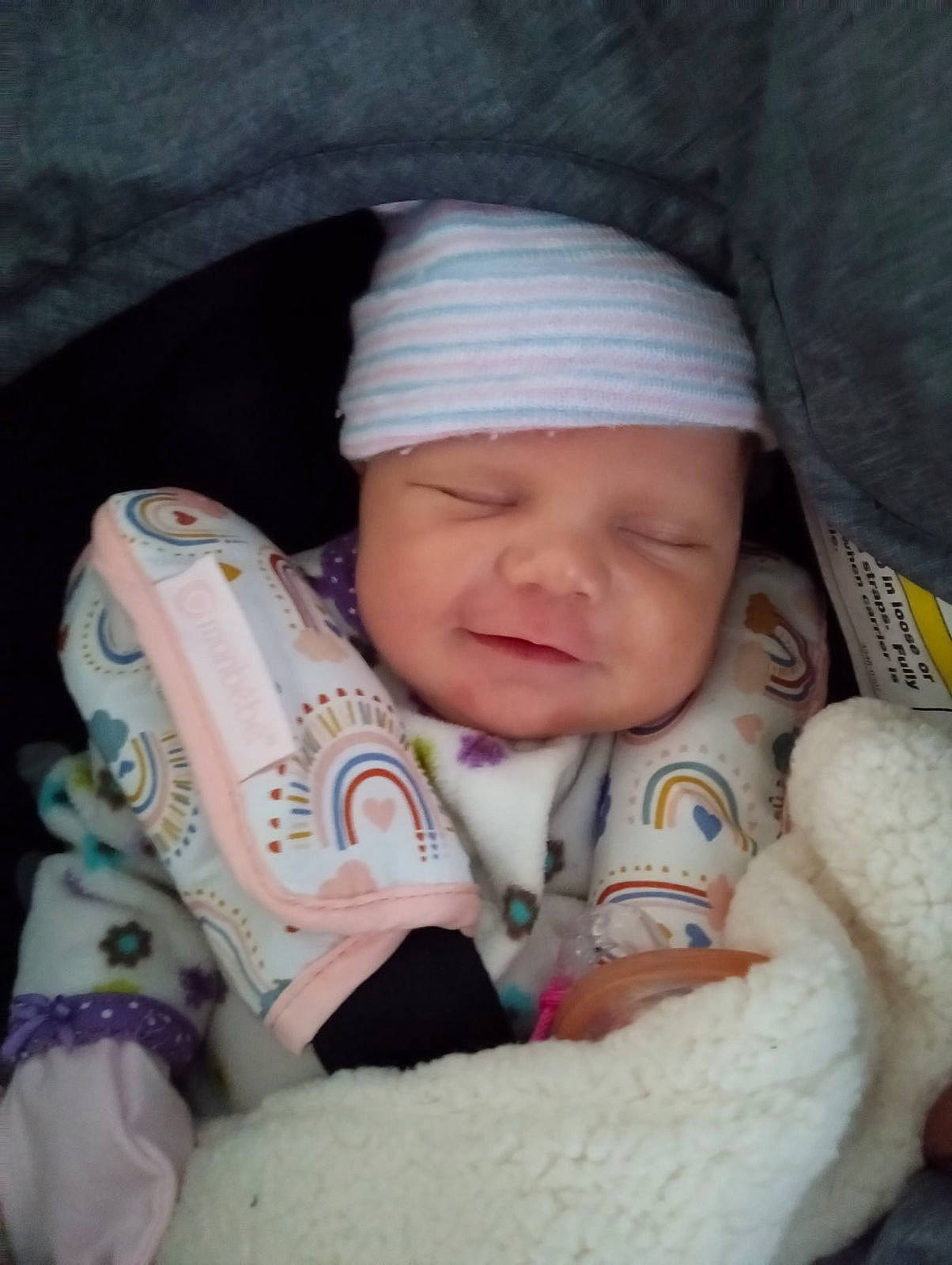 Lilianne is registered to the contest to win money with this photo: baby, baby_in_car_seat, baby_products, baby_sleeping, baby_toddler_clothing, cap, car_seat, cheek, child, comfort, finger, fur, head, headwear, linens, nose, person, sitting, skin, sleep