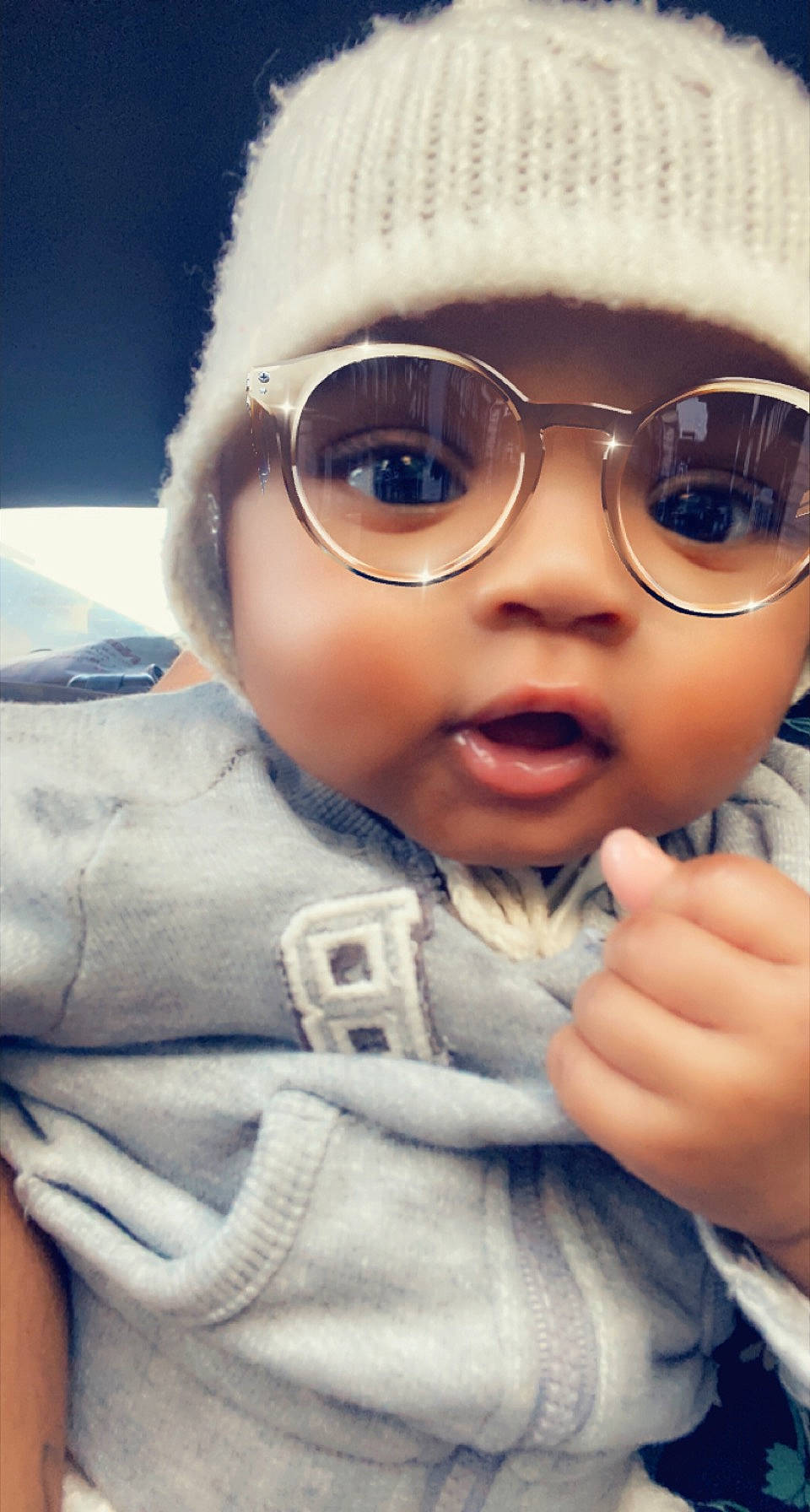 Malyana participe au concours pour gagner de l'argent avec cette photo : cap, cheek, chin, eye, eyewear, finger, forehead, gesture, glasses, happy, head, headwear, lip, mouth, nose, outerwear, person, skin, sleeve, smile