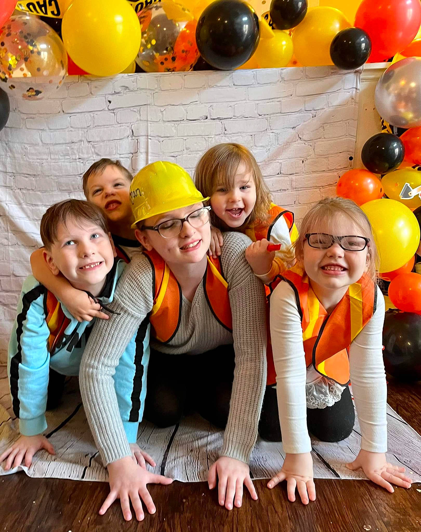 Harmony is registered to the contest to win money with this photo: balloon, beauty, child, community, event, facial_expression, friendship, fun, happy, headwear, joy, leisure, orange, party_supply, person, photograph, smile, snapshot, social_group, vest