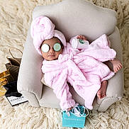Sarina is registered to the contest to win money with this photo: baby, carpet, chair, child, cucumber_slices, cute, fashion, indoor, luxury, pampering, pearls, pink, portrait, relaxing, robe, shopping_bags, spa, starbucks_cup, tiffany_bag, towel