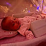 Stella joined the competition — help win amazing prizes! baby, sleeping, crib, pajamas, blanket, pillow, soft_lighting, night_light, stars, nursery, infant, peaceful, child, indoors, resting, comfort, bedtime, cute, calm, portrait