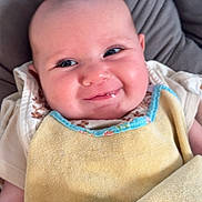 Lyzon participe au concours pour gagner de l'argent avec cette photo : baby, blanket, child, closeup, clothing, comfort, cozy, cushion, cute, expression, face, happy, head, indoors, infant, portrait, skin, smiling, soft, young