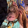 dog, sleeping, pet, blanket, hand, cozy, indoor, brown_dog, relaxation, animal, fur, wrinkles, comfort, bedroom, resting, human_hand, nap, canine, domestic_animal, soft_lighting