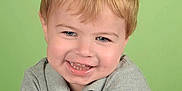Wyatt is registered to the contest to win money with this photo: child, smile, portrait, blond_hair, blue_eyes, polo_shirt, green_background, happy, casual_clothing, cute, toddler, face, person, young_child, studio_photo, short_sleeves, light_skin, button, indoors, head_and_shoulders