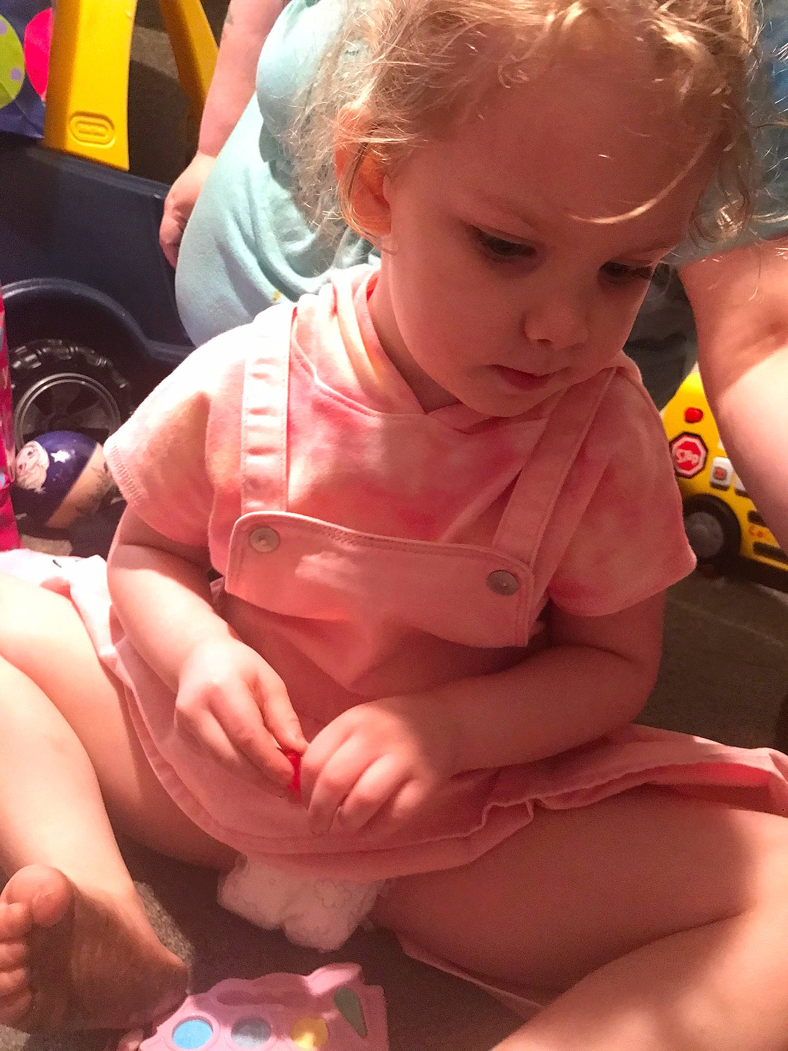 Kayla is registered to the contest to win money with this photo: baby, baby_toddler_clothing, chest, child, dress, finger, fun, hairstyle, happy, knee, lap, mouth, muscle, orange, person, pink, skin, thigh, thumb, toddler