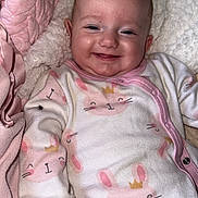 Isabelle joined the competition — help win amazing prizes! baby, infant, smiling, onesie, pink, white, bunny_print, blanket, cozy, cute, child, face, happy, sleepwear, soft, portrait, indoors, young, toddler, comfort