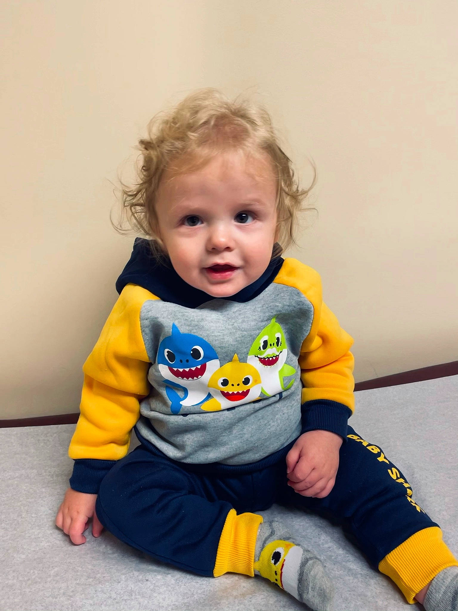Devin Jr is registered to the contest to win money with this photo: baby, baby_toddler_clothing, cheek, chin, clothing, collar, dress, eye, facial_expression, floor, flooring, happy, head, human, orange, person, skin, sleeve, smile, t_shirt