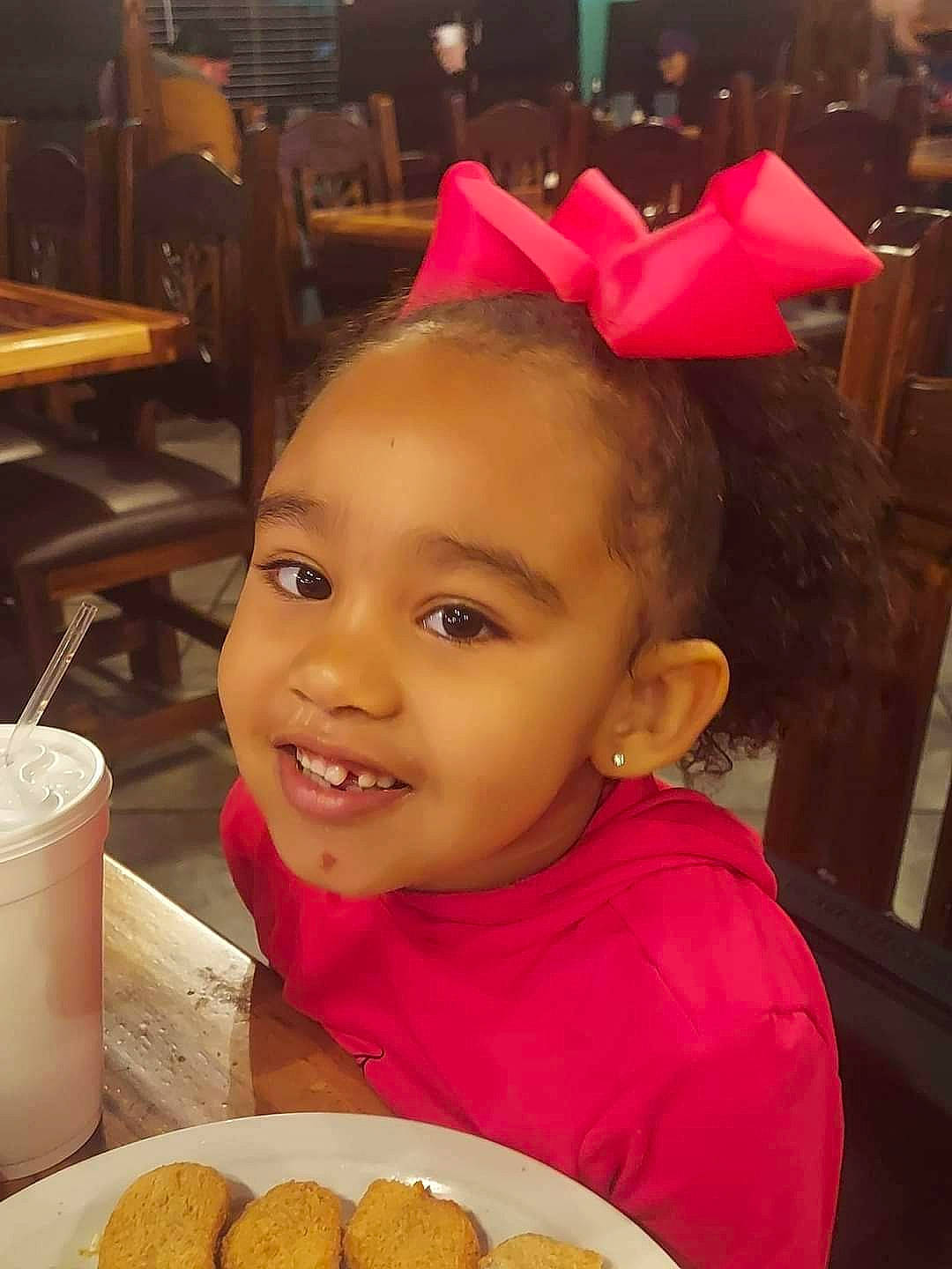 Makayla is registered to the contest to win money with this photo: baked_goods, baking, chair, cheek, child, comfort_food, cuisine, dish, event, fashion_accessory, finger_food, food, hair_accessory, happy, headband, ingredient, joy, person, smile, sweetness