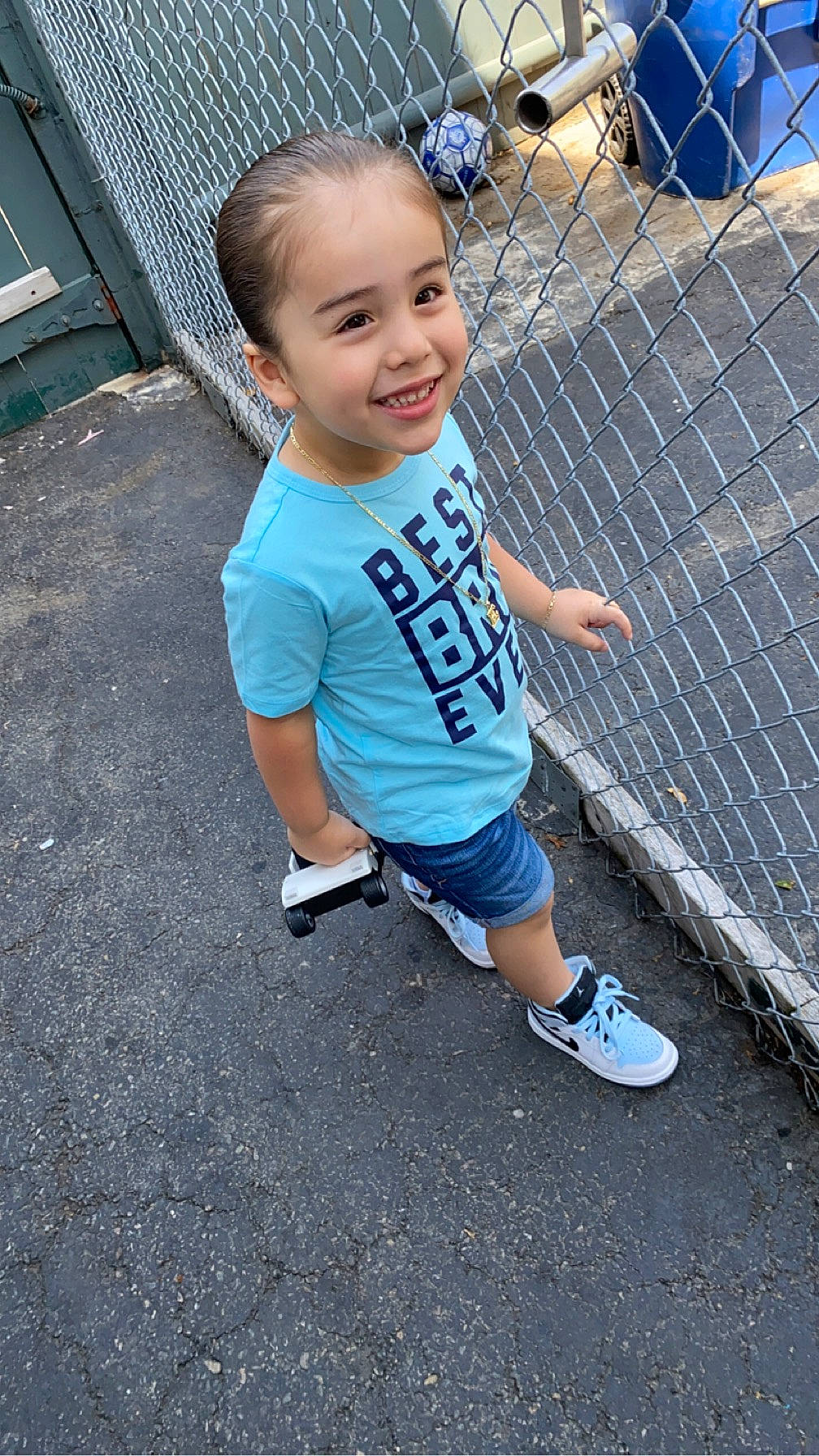 Elvin joined the competition — help win amazing prizes! asphalt, electric_blue, fence, footwear, grass, hairstyle, happy, head, joy, leg, leisure, mesh, person, recreation, road_surface, shorts, smile, sneakers, t_shirt, thigh