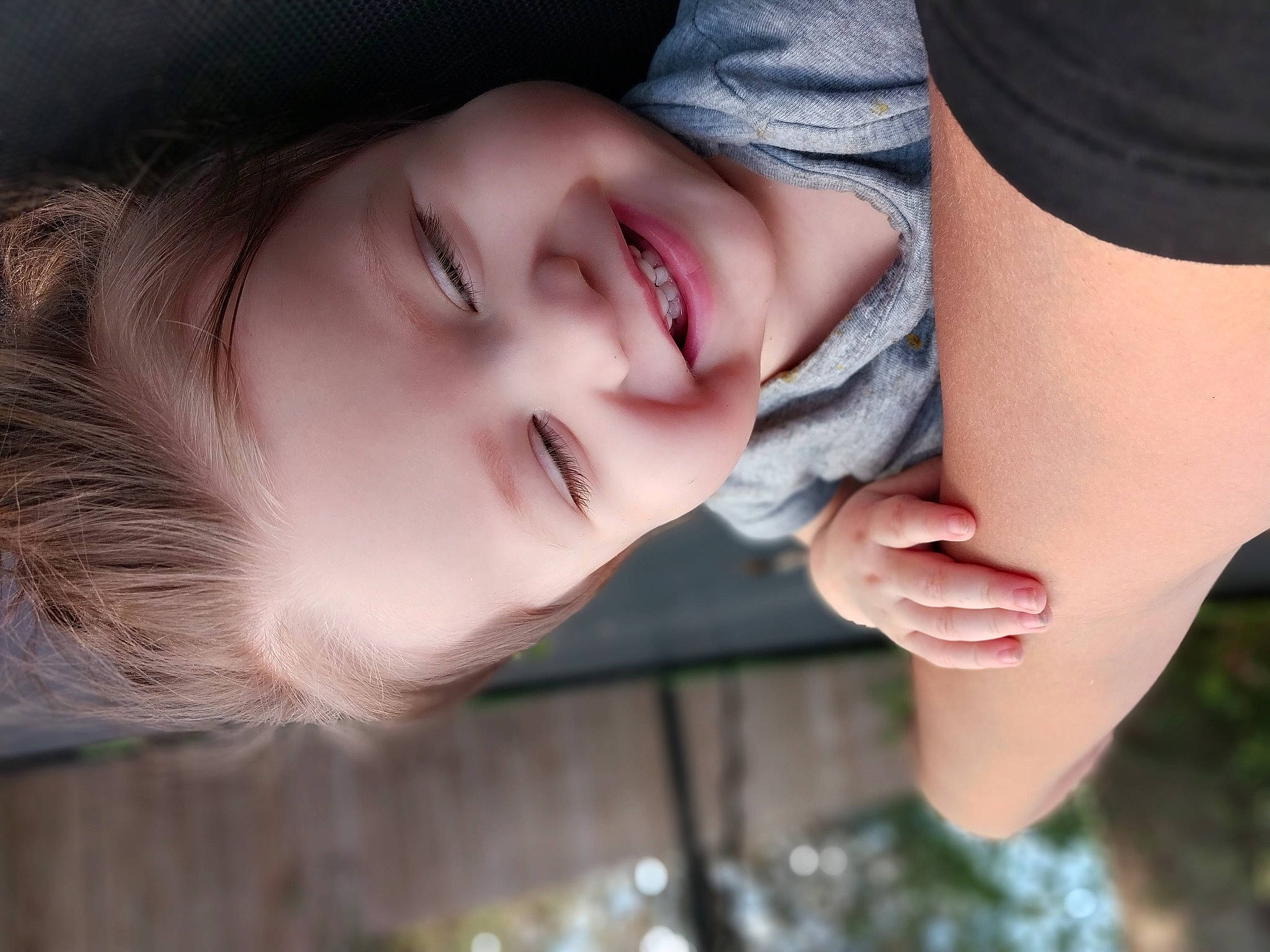 Genesis is registered to the contest to win money with this photo: arm, chin, cool, facial_expression, finger, flash_photography, gesture, grass, hand, happy, joy, lip, mouth, neck, nose, people_in_nature, person, plant, skin, smile