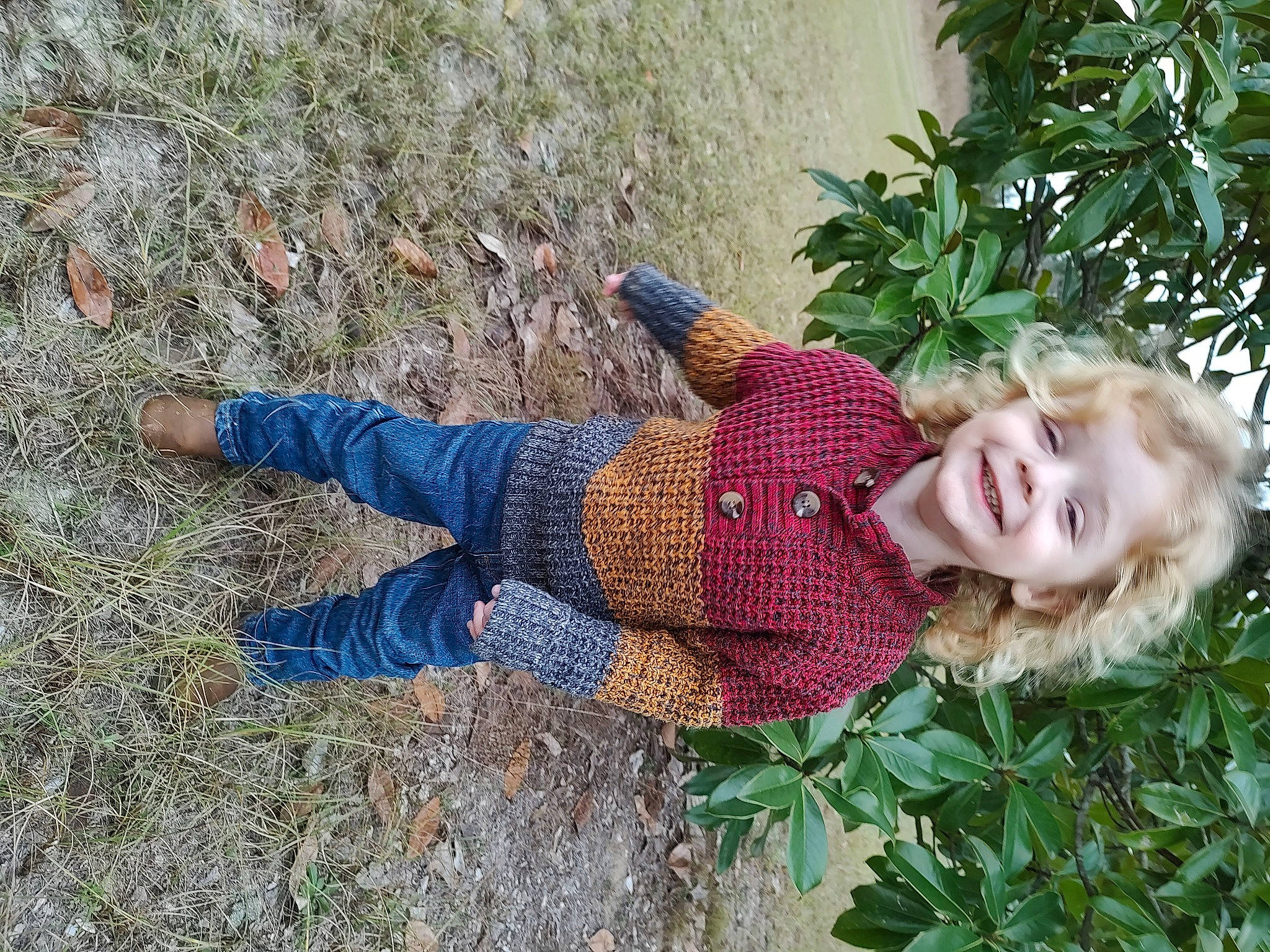 Sampson-jacob joined the competition — help win amazing prizes! baby_toddler_clothing, child, electric_blue, fun, grass, grass_family, groundcover, happy, joy, pattern, people_in_nature, person, plant, shrub, sitting, smile, soil, toddler, tree