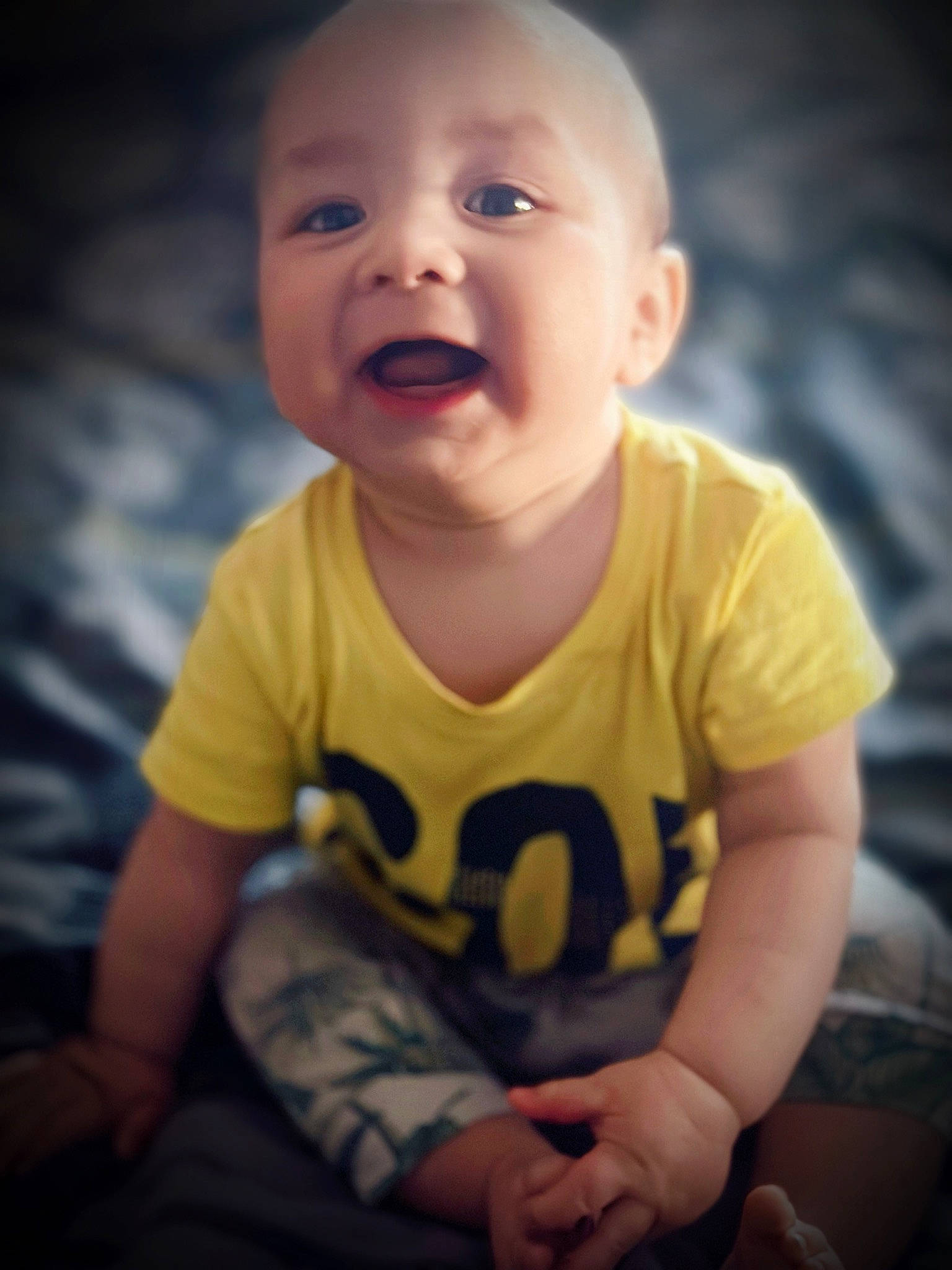 Deàgan is registered to the contest to win money with this photo: arm, baby, baby_toddler_clothing, cheek, child, cloud, cool, eye, finger, flash_photography, hand, happy, human_body, mouth, nose, person, skin, sleeve, smile, t_shirt