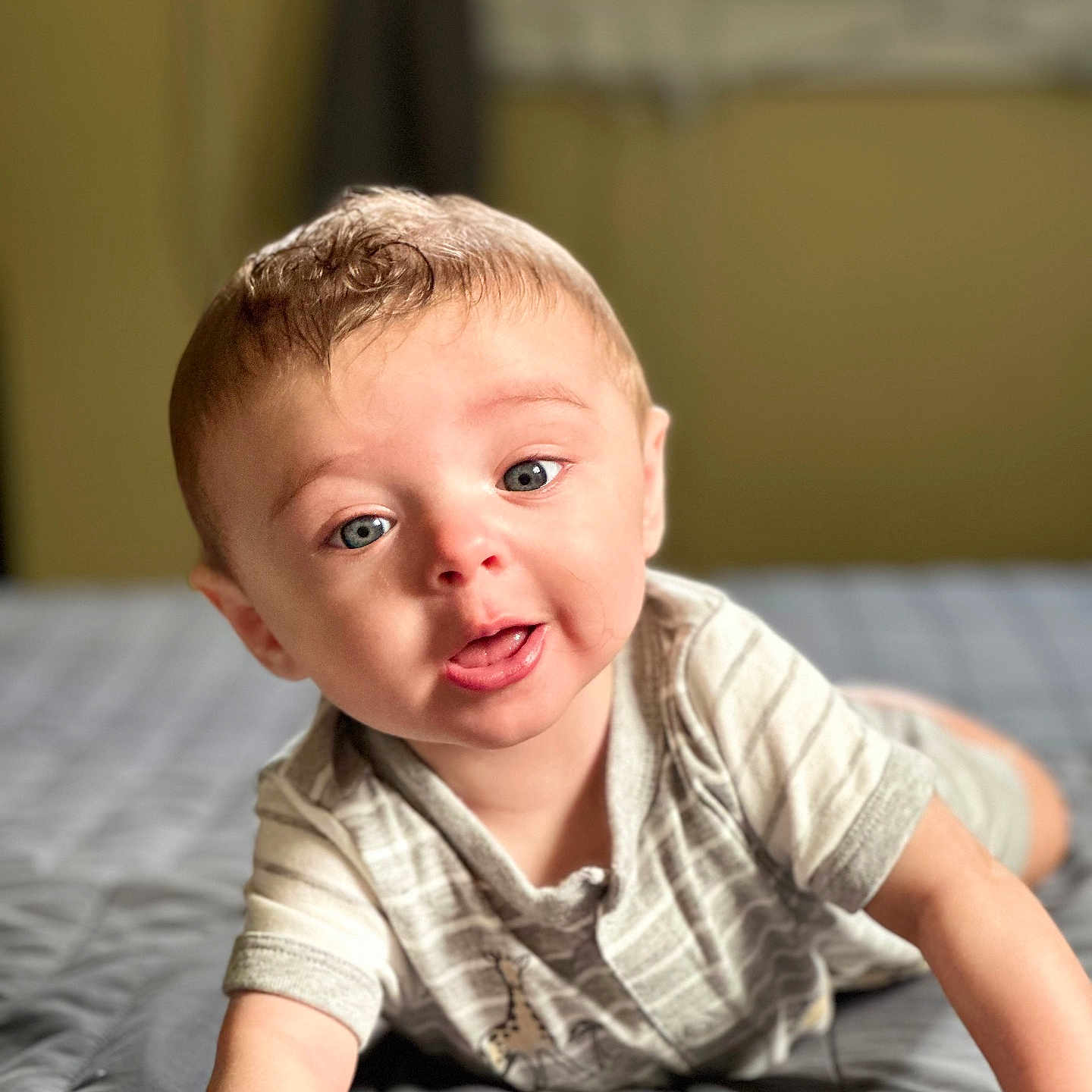 Marshall is registered to the contest to win money with this photo: baby, bed, bedroom, blonde, bodypart, crawling, crying, face, finger, furniture, hair, hand, happy, head, indoors, person, photography, portrait, sad, smile