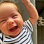 Charly a rejoint le concours — aidez-le/la à gagner de superbes lots ! arm, baby, cheerful, child, closeup, couch, cute, expression, face, hand, happy, indoor, infant, joy, laughing, person, skin, smiling, striped_shirt, texture