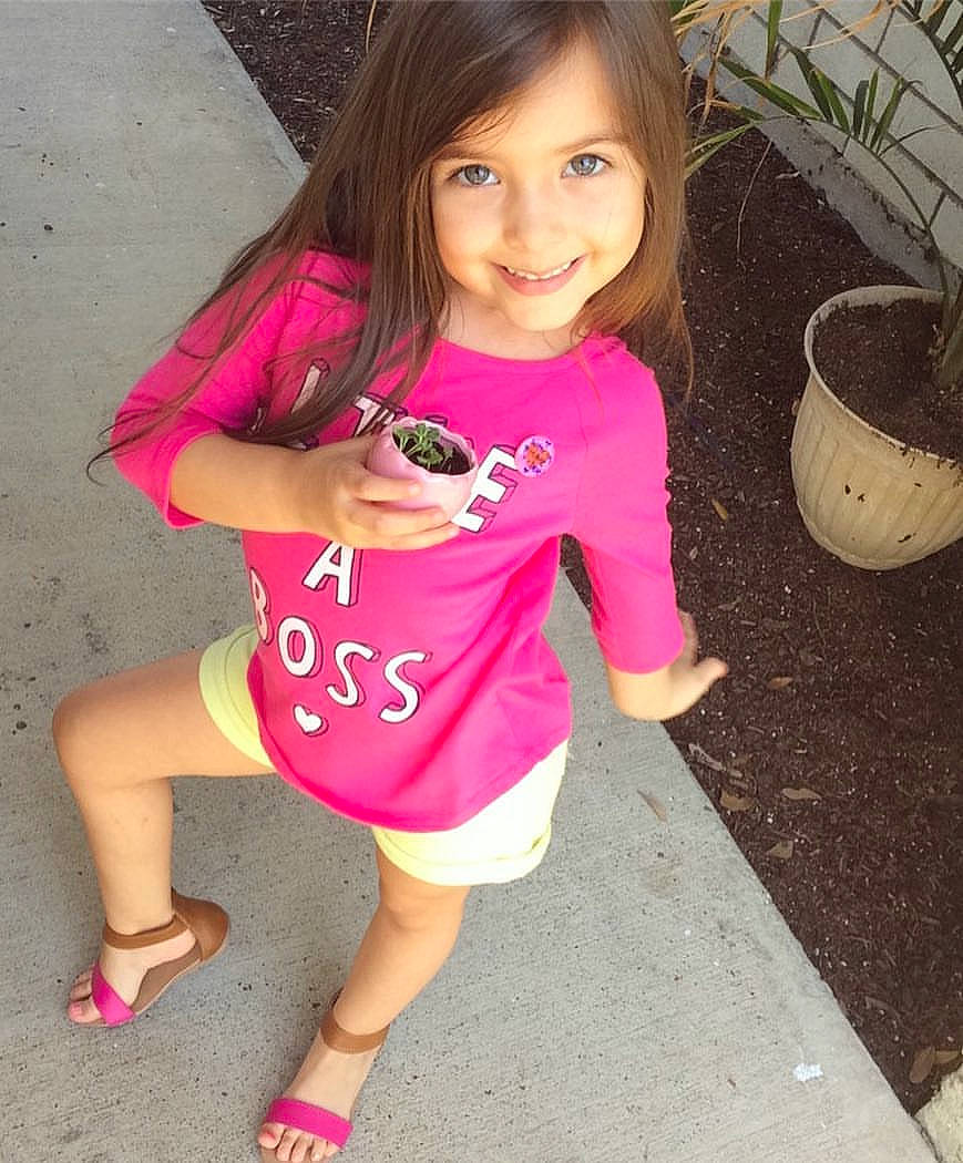 Frida Garza is registered to the contest to win money with this photo: beauty, child, child_model, clothing, cool, day, footwear, girl, joint, joy, leg, magenta, person, pink, product, shorts, shoulder, skin, smile, summer