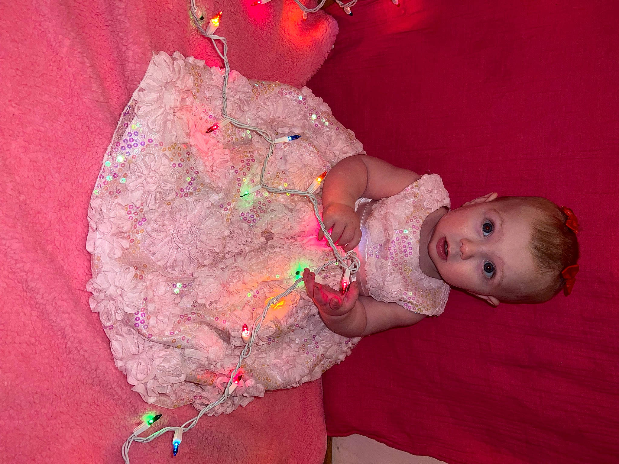 Rylee joined the competition — help win amazing prizes! baby, baby_products, baby_toddler_clothing, cheek, child, flooring, fun, hand, happy, magenta, pattern, person, pink, play, room, sitting, skin, surprise, toddler