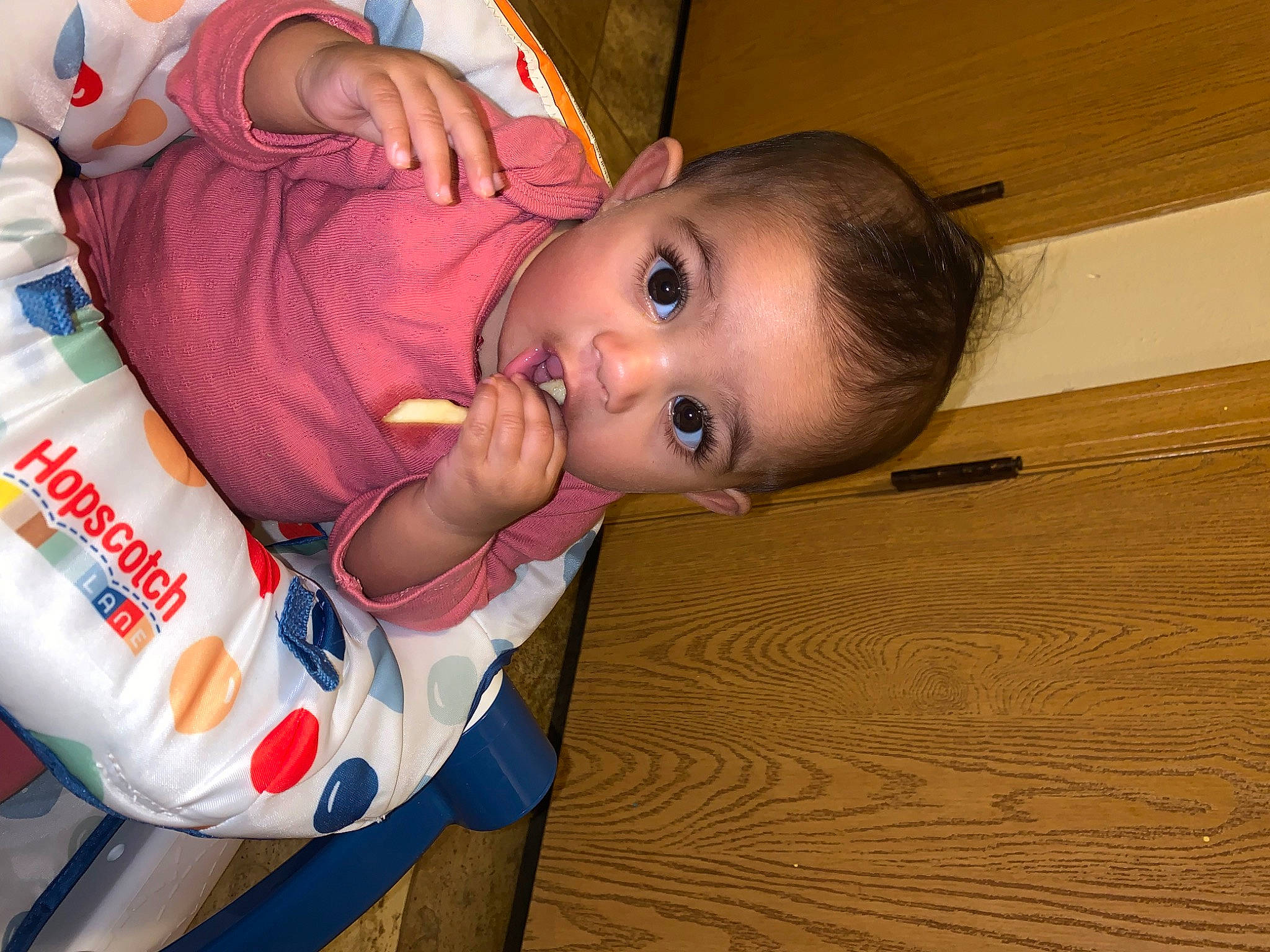 Amari is registered to the contest to win money with this photo: baby, baby_products, baby_toddler_clothing, cheek, child, comfort_food, flooring, fun, happy, hardwood, nose, person, surprise, toddler, varnish, wood, wood_flooring