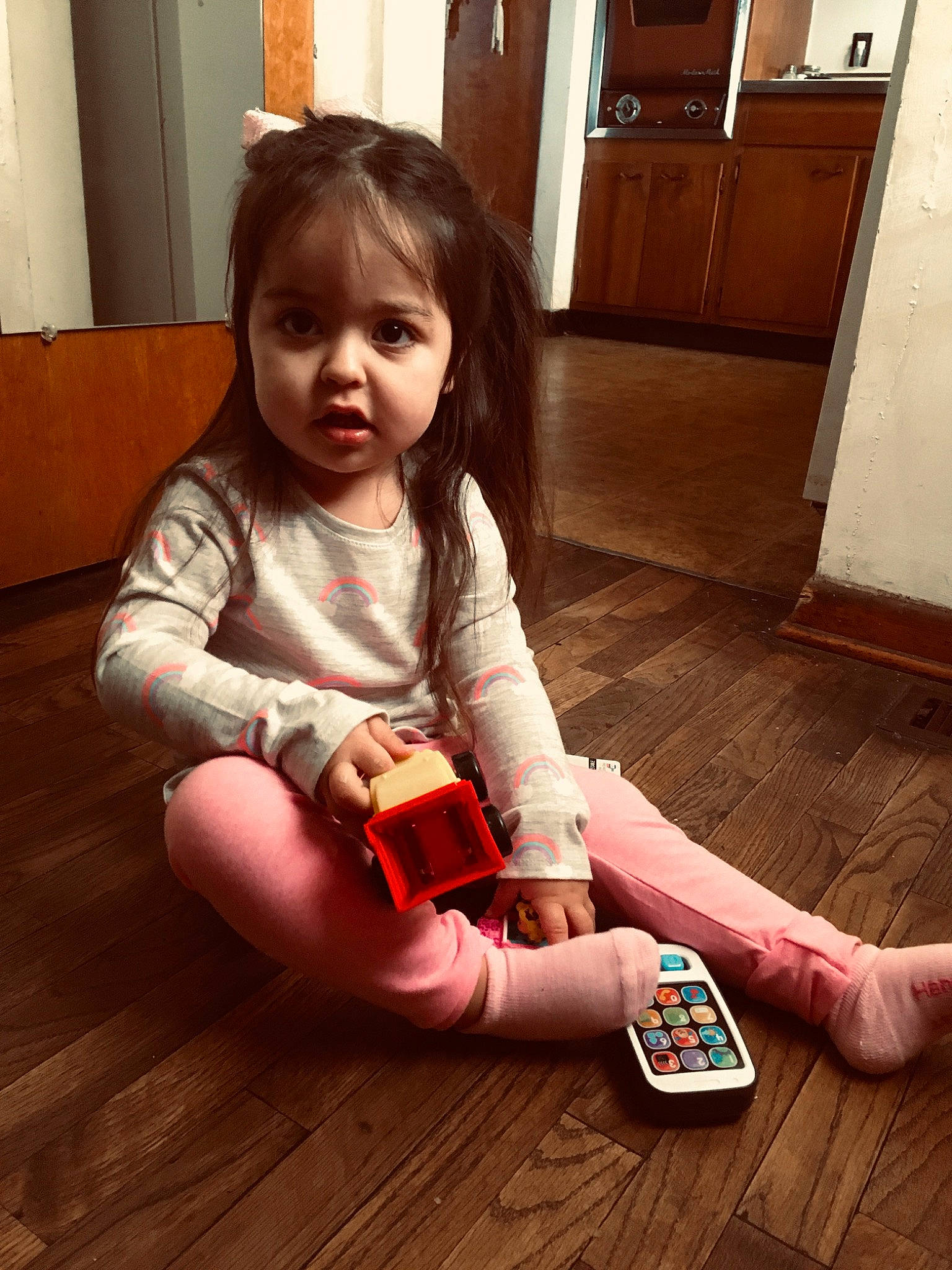 Kianna is registered to the contest to win money with this photo: child, floor, flooring, person, play, sitting, toddler, wood