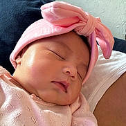 Stella is registered to the contest to win money with this photo: baby, blanket, bonnet, cap, childbirth, clothing, face, glove, happy, hat, head, newborn, person, photography, portrait, sleeping, smile
